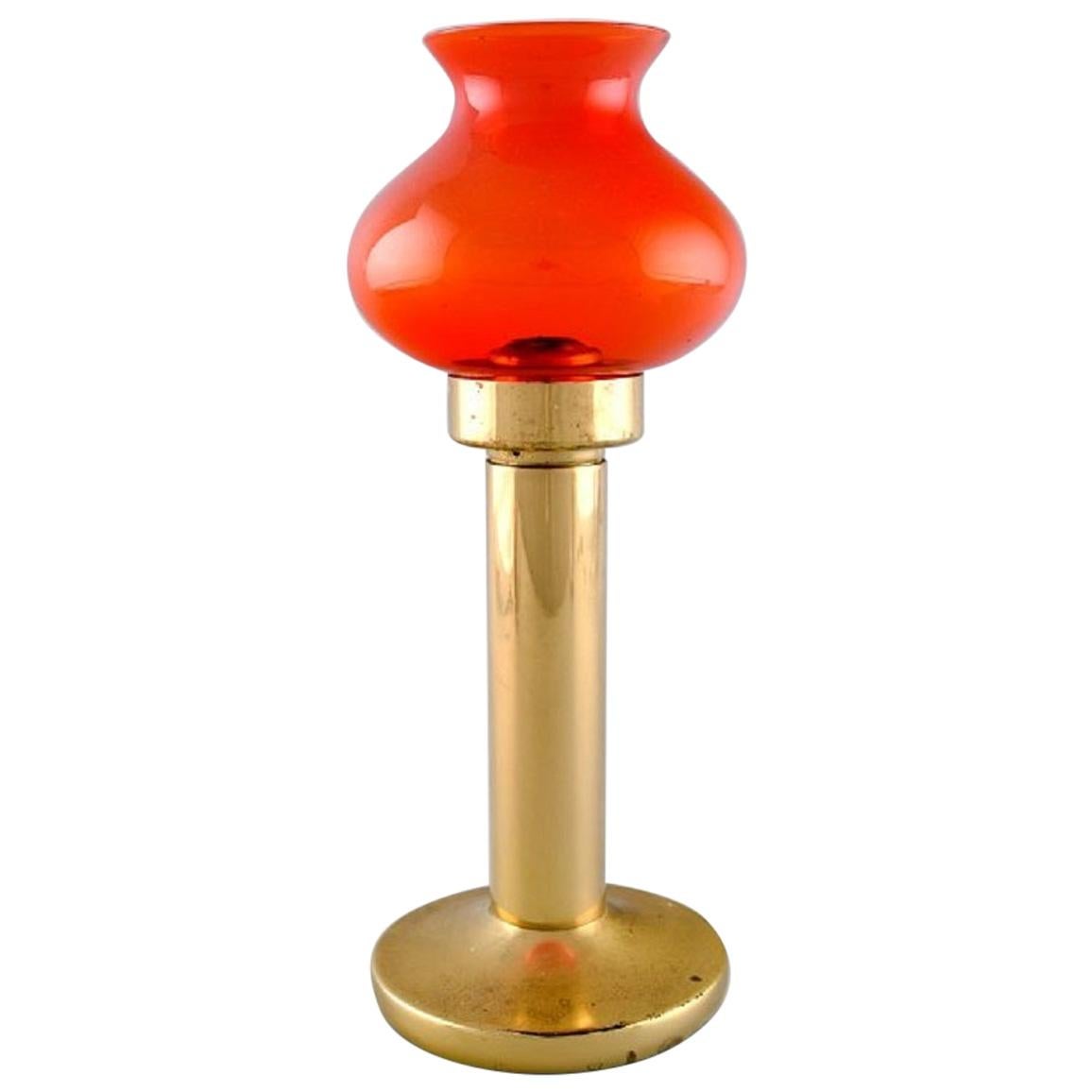 Hans-Agne Jakobsson for A / B Markaryd, Oil Lamps in Brass and Red Art Glass For Sale