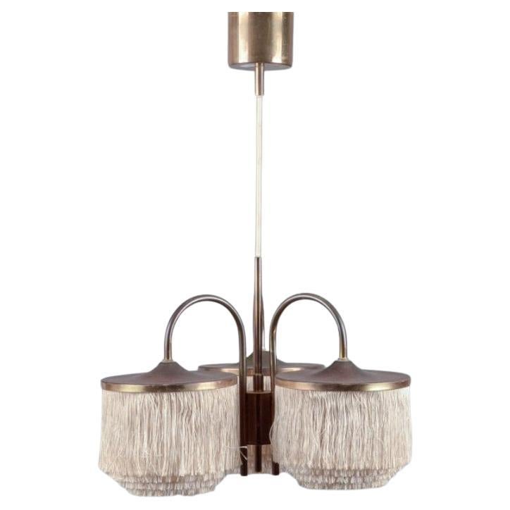 Hans-Agne Jakobsson per A/B Markaryd. Rara lampada da soffitto a tre bracci. in vendita
