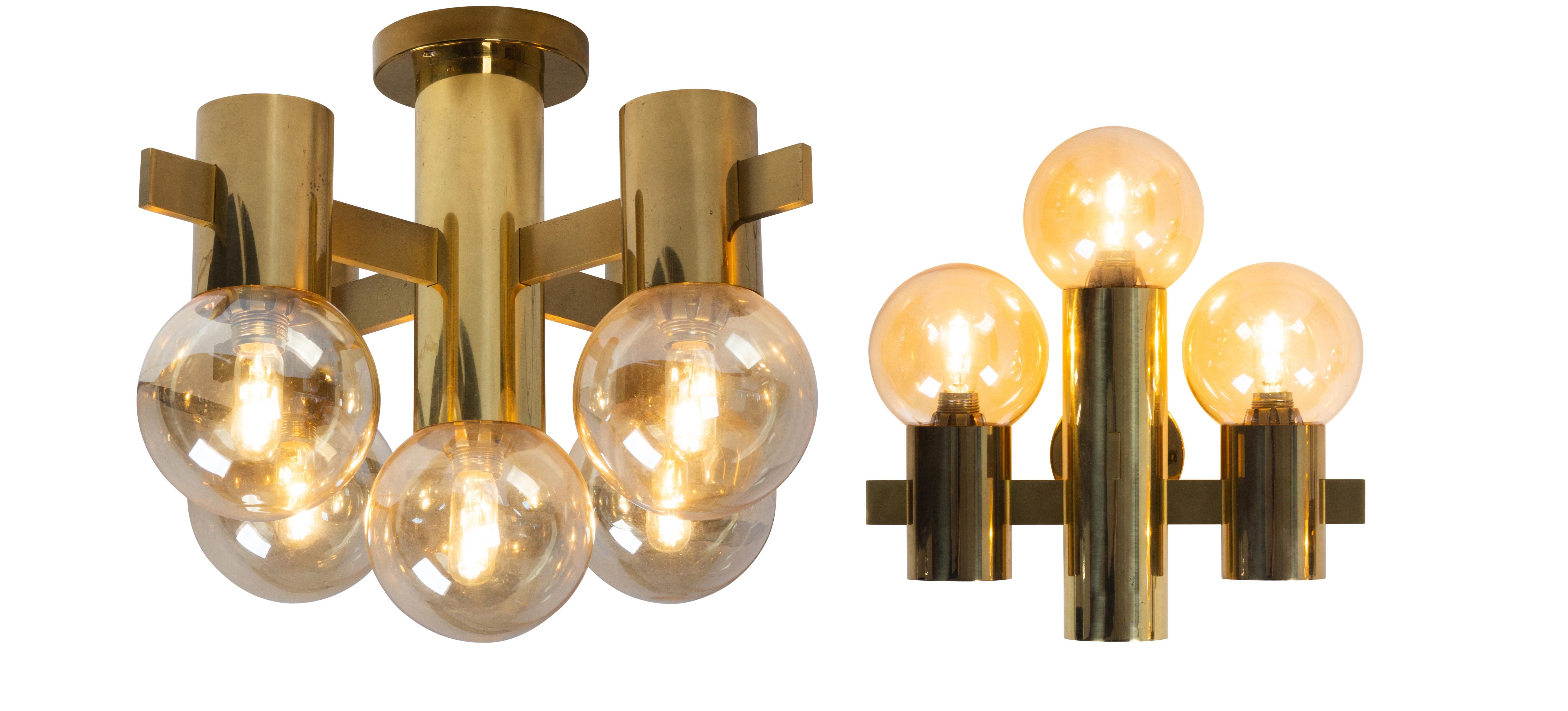 Hans Agne Jakobsson for teka, brass wall and ceiling light. Beautiful light fixtures with smoke glass.