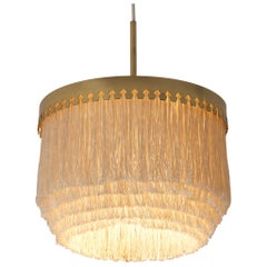 Ciondolo 
Fringe
 di Hans-Agne Jakobsson in seta e ottone