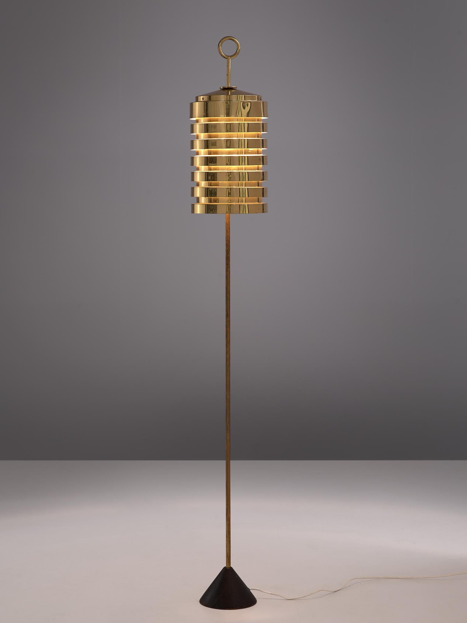 Hans Agne Jakobsson for AB Markaryd, 'G20' floor lamp, brass and iron, Sweden, 1950s

Brass cylindrical shaped floor lamp designed by the Swedish light designer Hans Agne Jakobsson. The shade consists of several brass layers that creates a