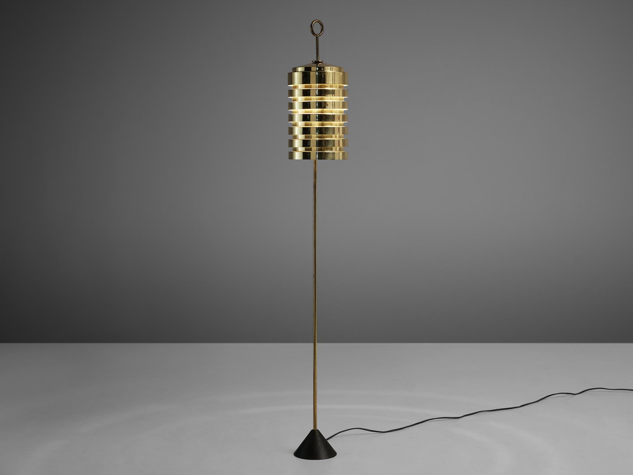 Hans-Agne Jakobsson for AB Markaryd, floor lamp 'G20', brass, iron, Sweden, 1950s

Floor lamp model ‘G20’ by Swedish designer Hans-Agne Jakobssen. From a small base in cone-shaped iron starts the thin stem. The design of the shade resting on top,