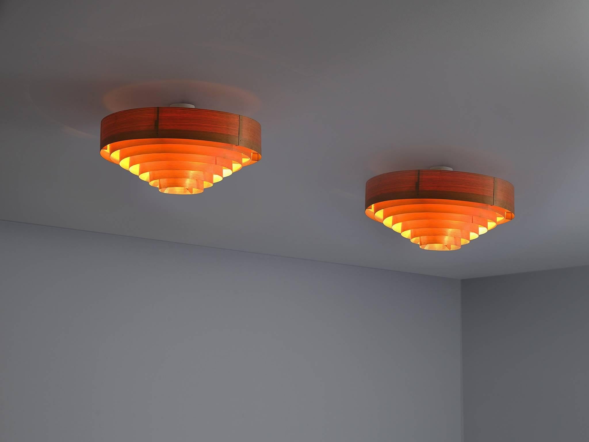 Hans-Agne Jakobsson for Markaryd, wooden ceiling lights, Sweden, 1960s.

This set of four ceiling lights is designed by Hans-Agne Jakobsson. The lamps have an organic and at the same time abstract tendency. The lamp is constructed out of extremely