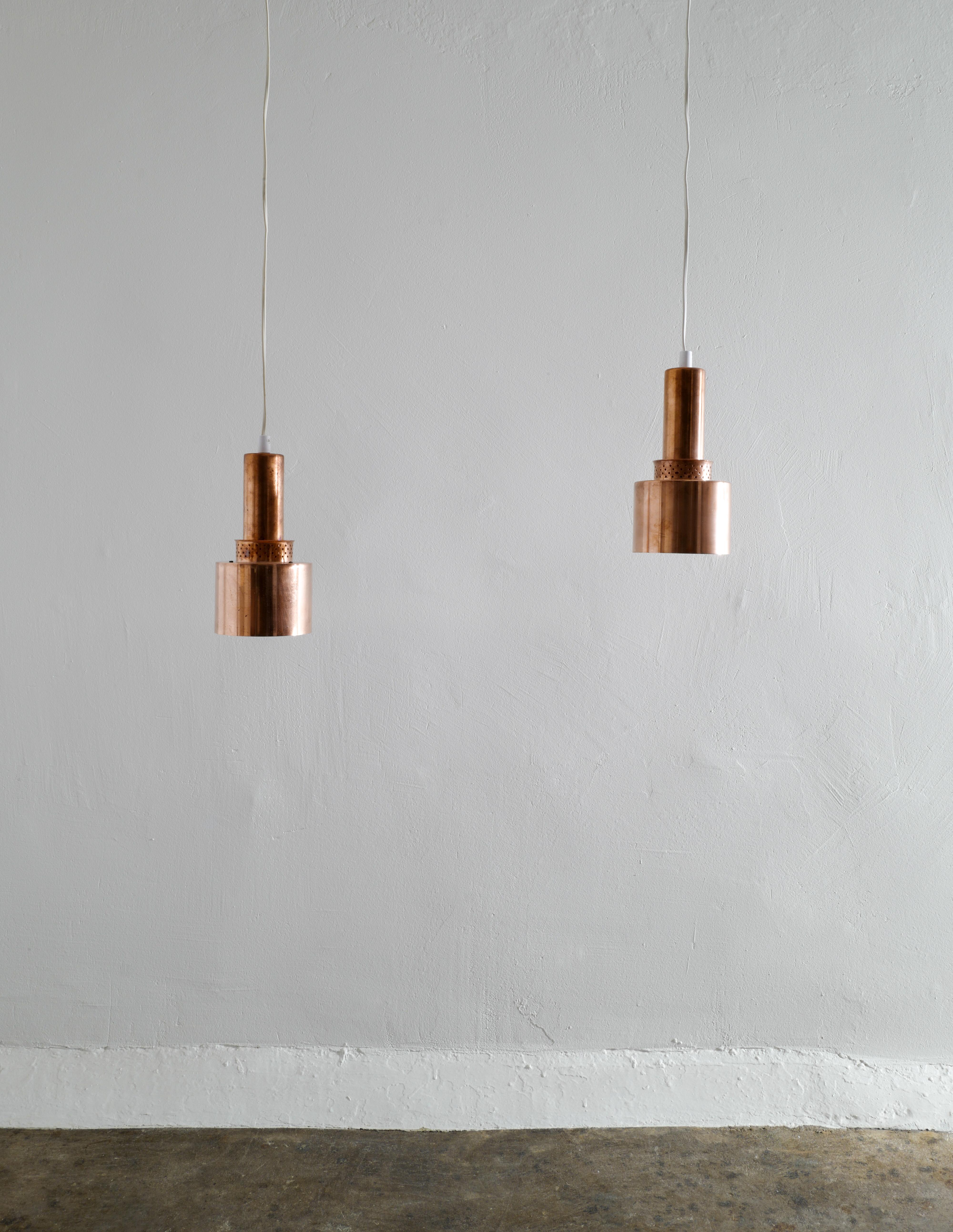 Rare copper pendant designed by Hans-Agne Jakobsson in 1958 and produced in the late 1950s or early 1960s. In good vintage and original condition showing beautiful patina from age and use. Newer wiring. 

Four pendants available. 

Measurements: