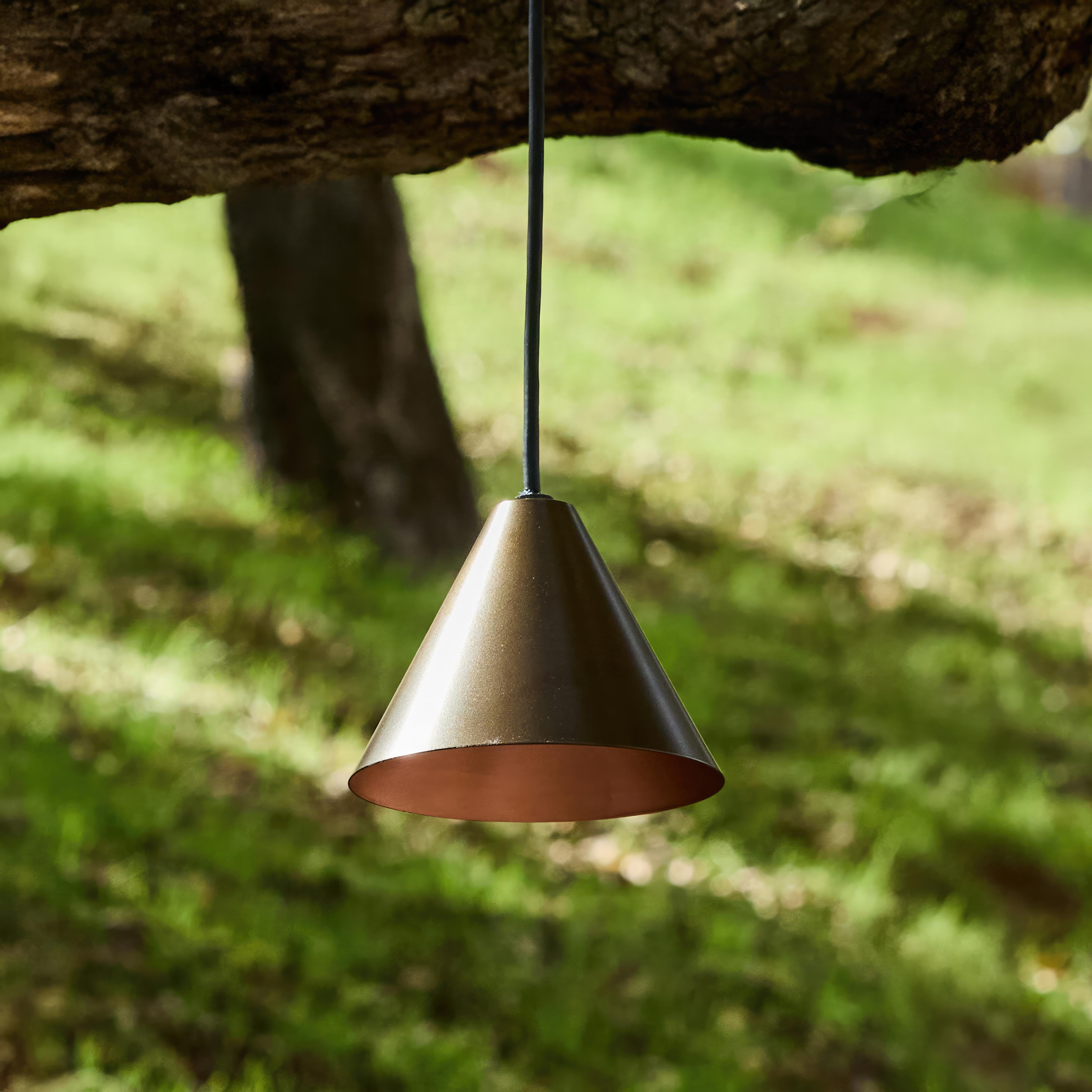 Hans-Agne Jakobsson 'Mini-Tratten' Outdoor Pendant in Brown.

An exclusive made for U.S. and UL listed authorized re-edition of the classic Swedish design from Jakobsson, executed in brown painted metal with a burnished interior finish. An
