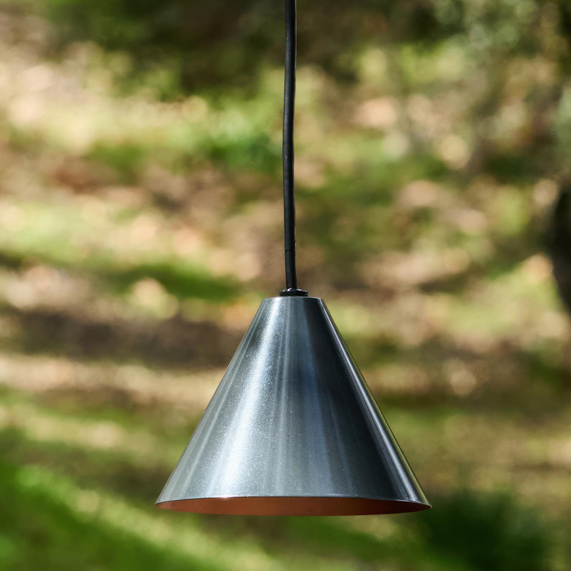 Hans-Agne Jakobsson 'Mini-Tratten' Outdoor Pendant in Steel

An exclusive made for U.S. and UL listed authorized re-edition of the classic Swedish design from Jakobsson, Executed in steel-colored painted metal with a burnished interior finish. An
