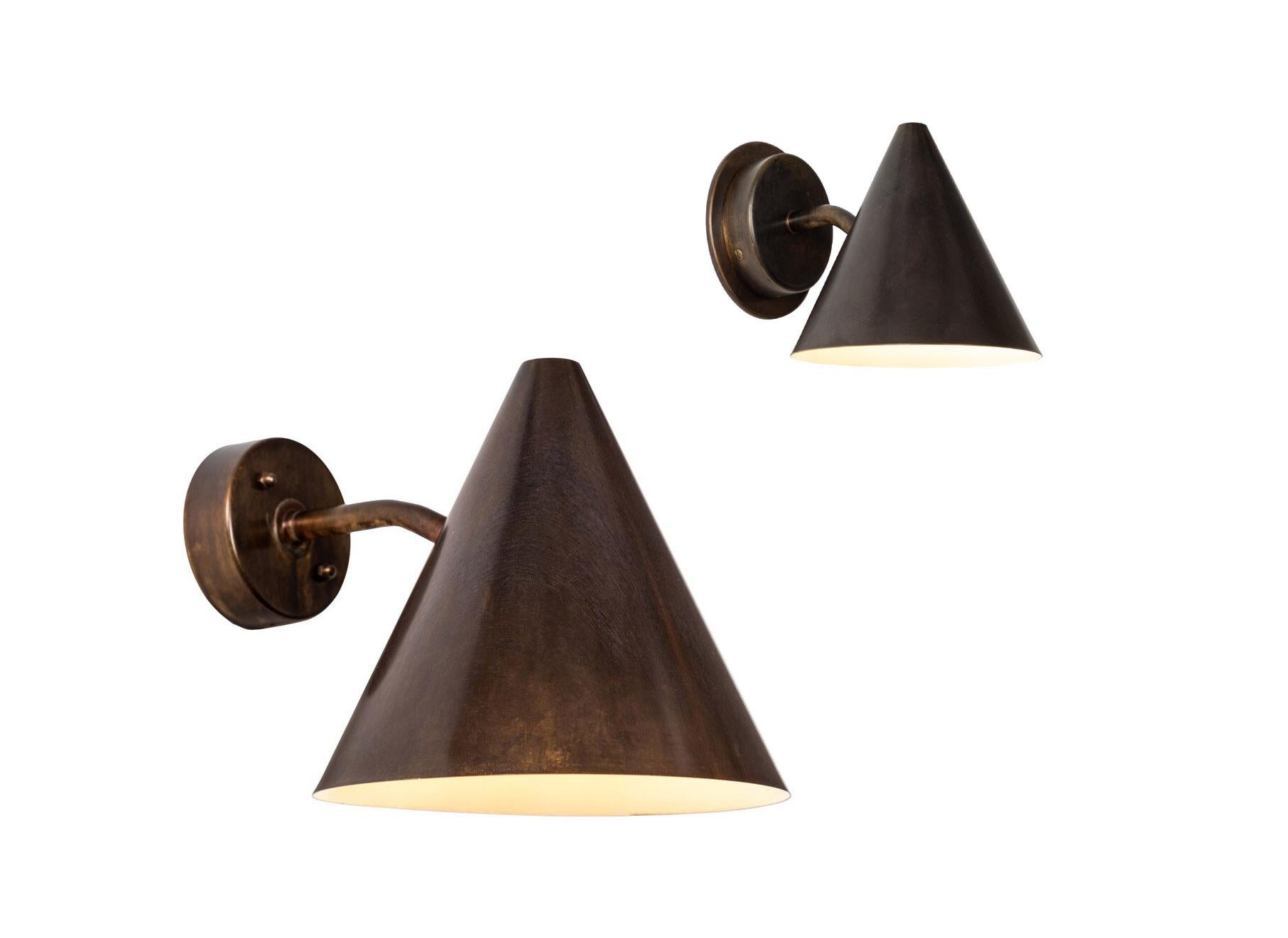 Hans-Agne Jakobsson 'Mini-Tratten' dark brown patinated outdoor sconce. A smaller scale version of the Classic Swedish outdoor wall lamp executed in richly patinated metal with white painted interior. An incredibly refined design that is