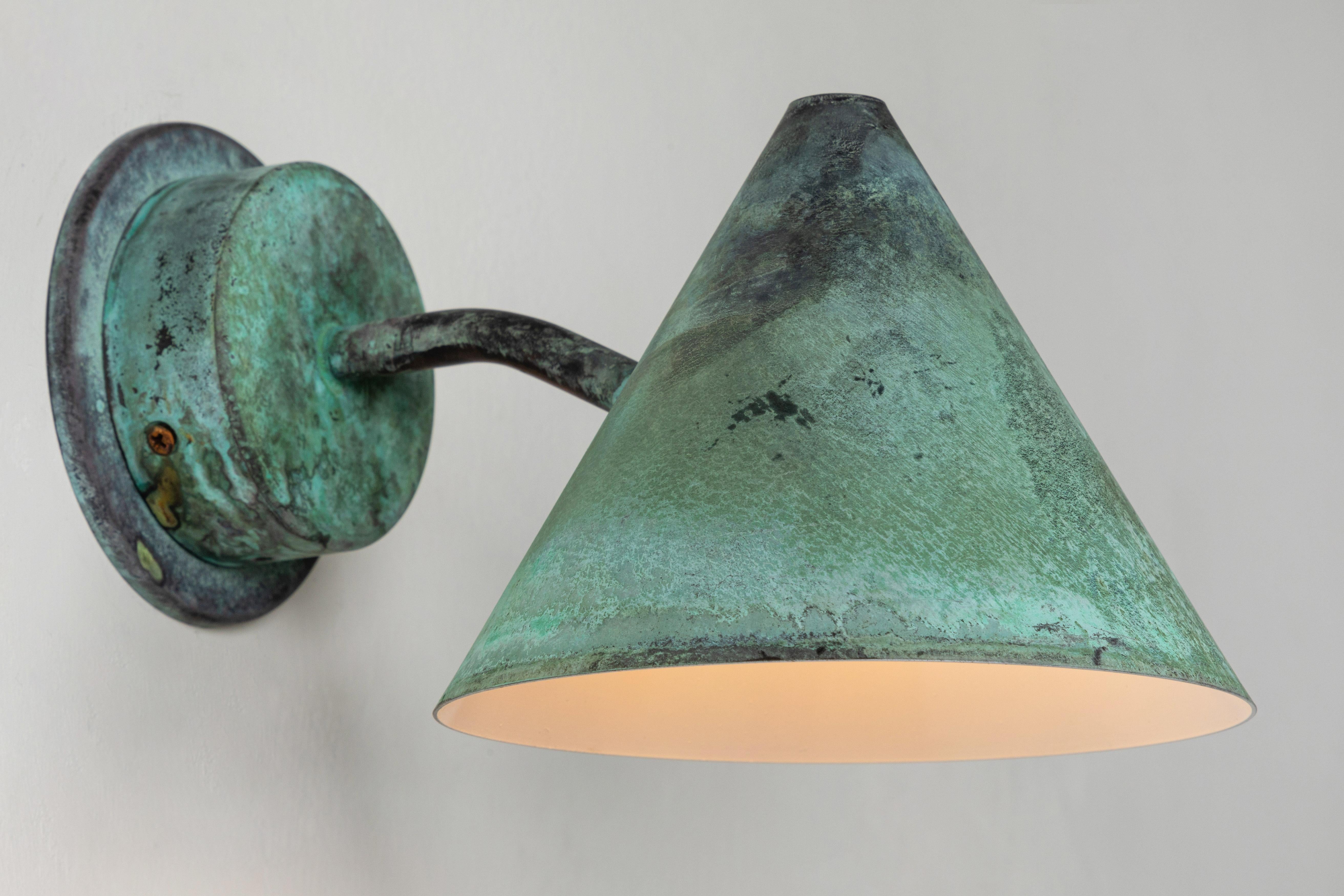 Hans-Agne Jakobsson 'Mini-Tratten' verdigris patinated outdoor sconce. A smaller scale version of the Classic Swedish outdoor wall lamp executed in rich verdigris patinated metal with white painted interior. An incredibly refined design that is