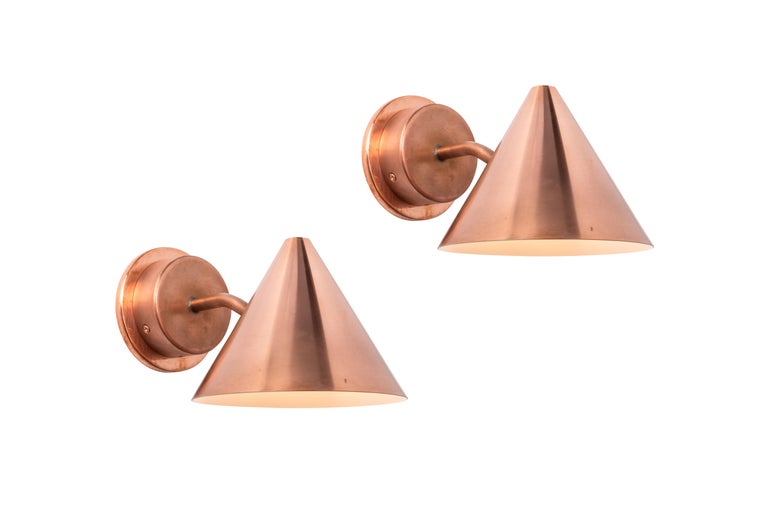 Hans-Agne Jakobsson 'Mini-Tratten' patinated copper outdoor sconce. A smaller scale version of the Classic Swedish outdoor wall lamp executed in richly patinated copper. An incredibly refined design that is quintessentially Scandinavian. Designed