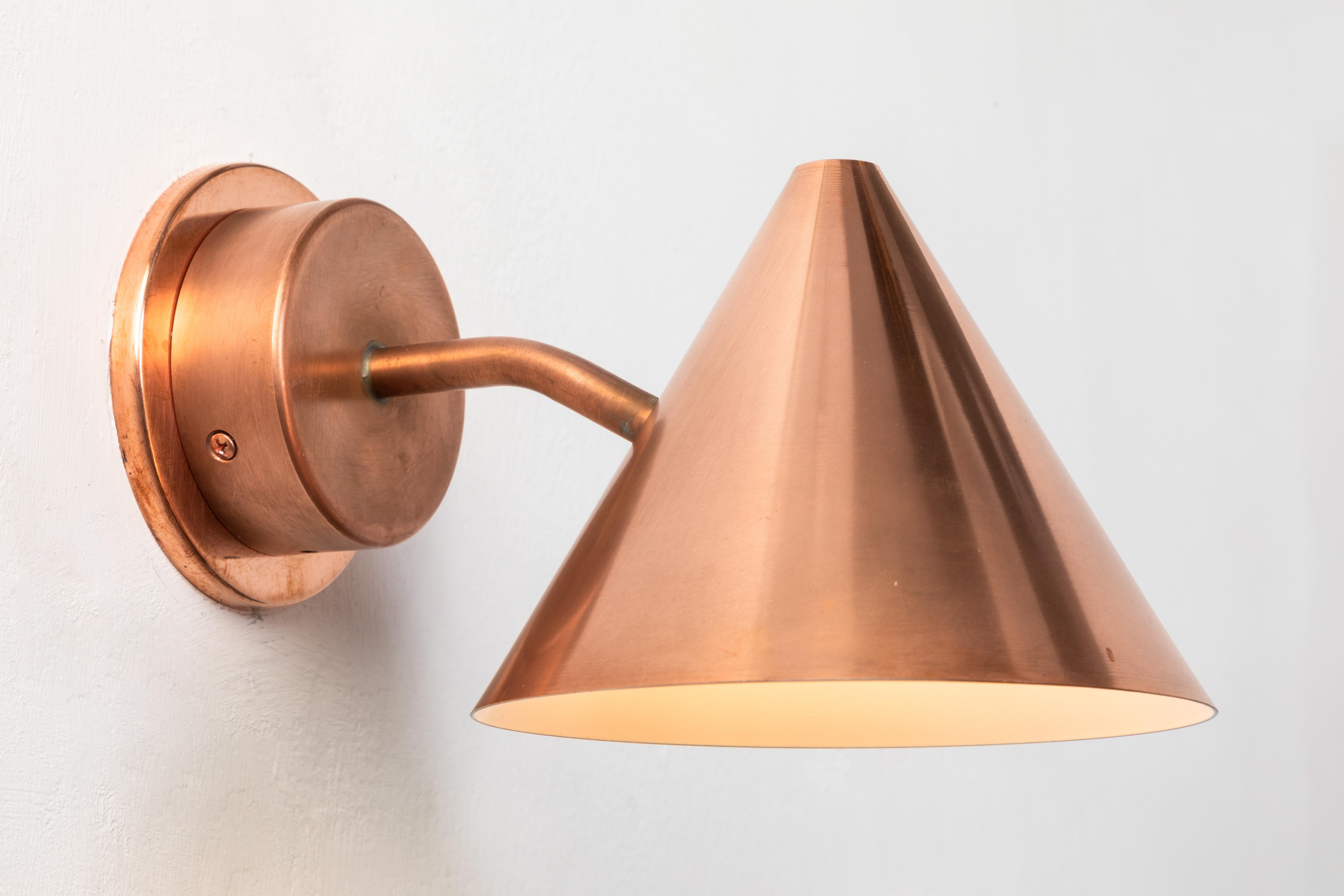 Hans-Agne Jakobsson 'Mini-Tratten' raw copper outdoor sconce. An exclusive made for U.S. and UL listed authorized re-edition of the classic Swedish design executed in raw copper with white painted interior. An incredibly refined design that is