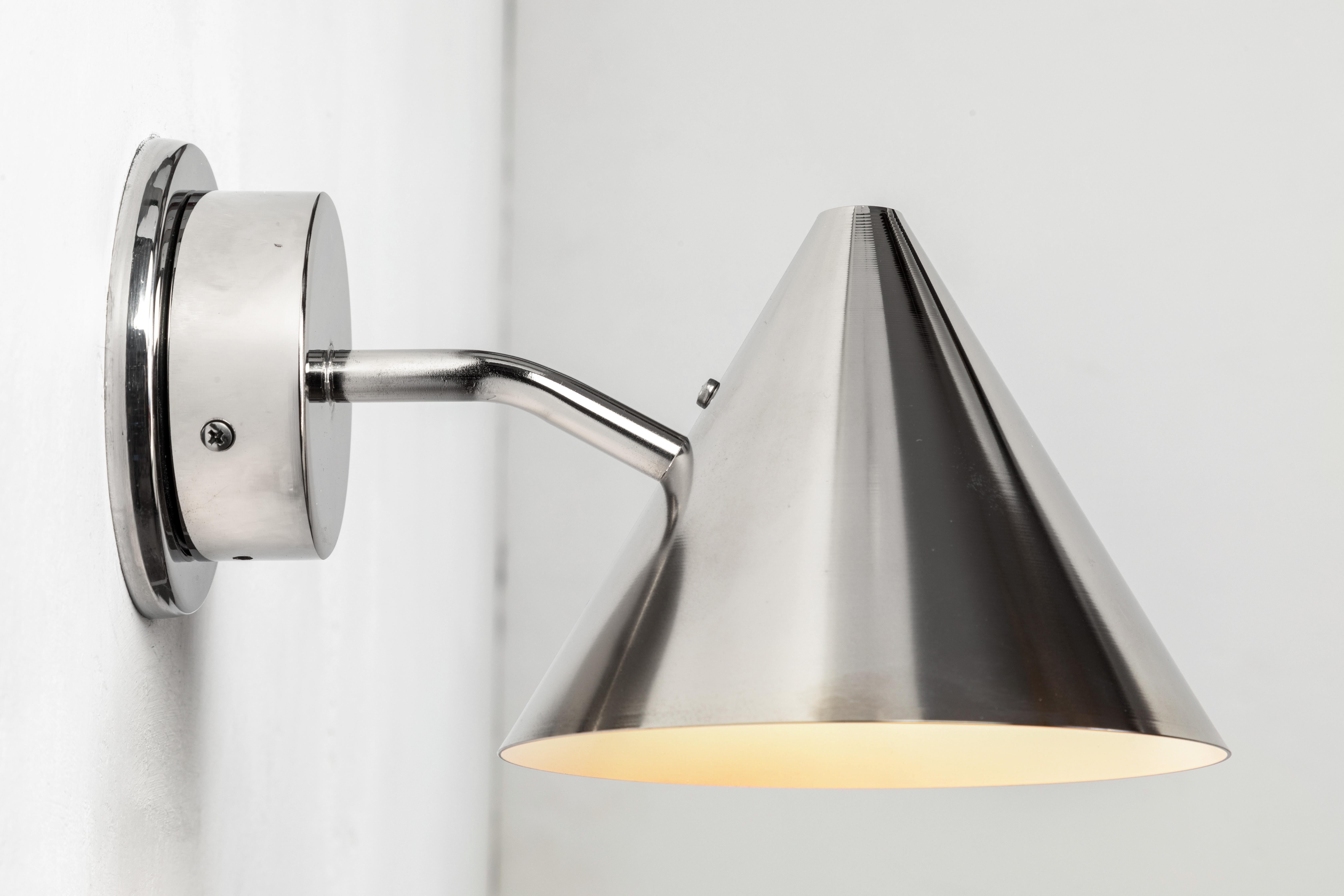 Hans-Agne Jakobsson 'Mini-Tratten' polished nickel outdoor sconce. An exclusive made for U.S. and UL listed authorized re-edition of the classic Swedish design executed in polished nickel. An incredibly refined design that is quintessentially