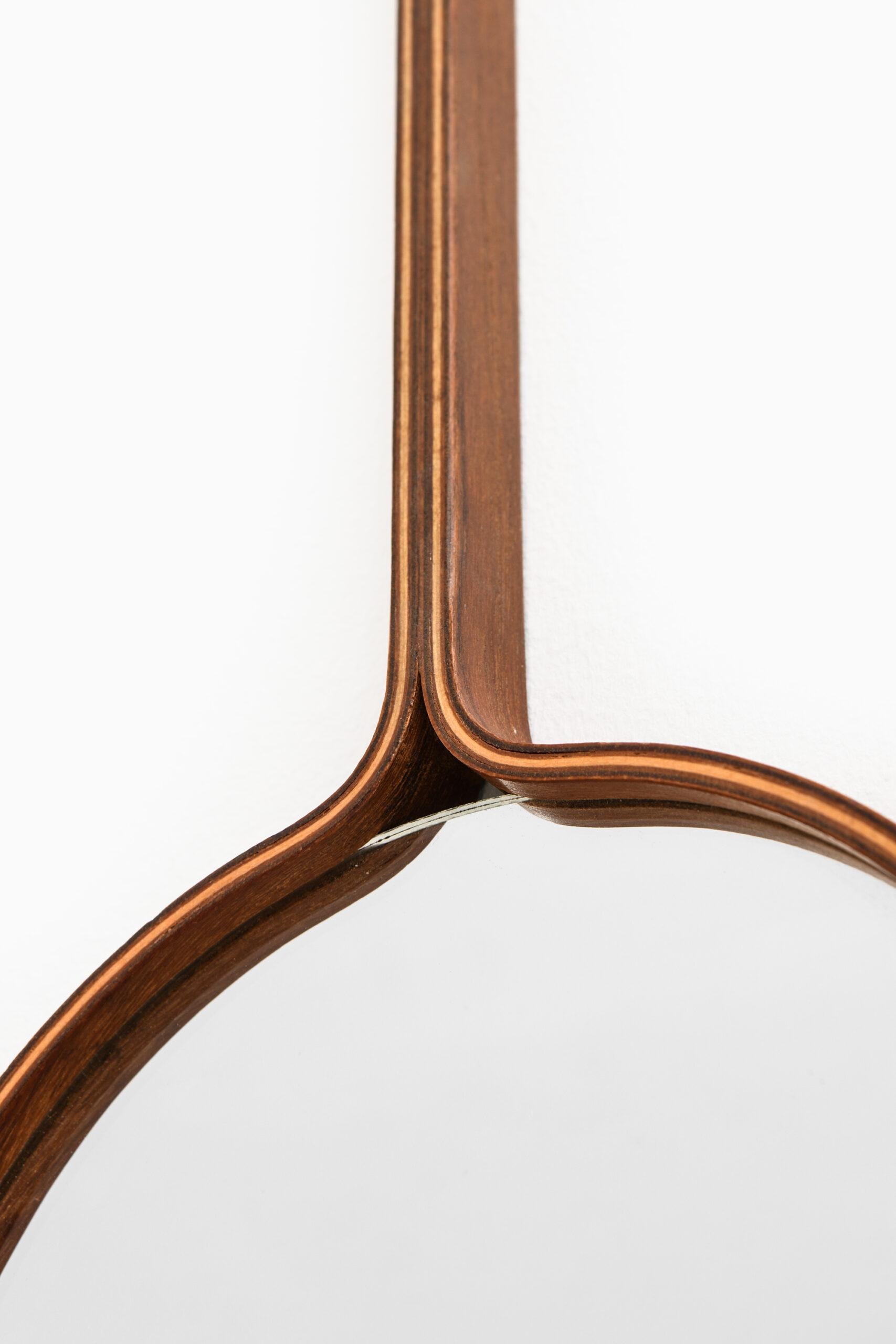 Rare mirror / hand mirror designed by Hans-Agne Jakobsson. Produced by Hans-Agne Jakobsson in Markaryd, Sweden.