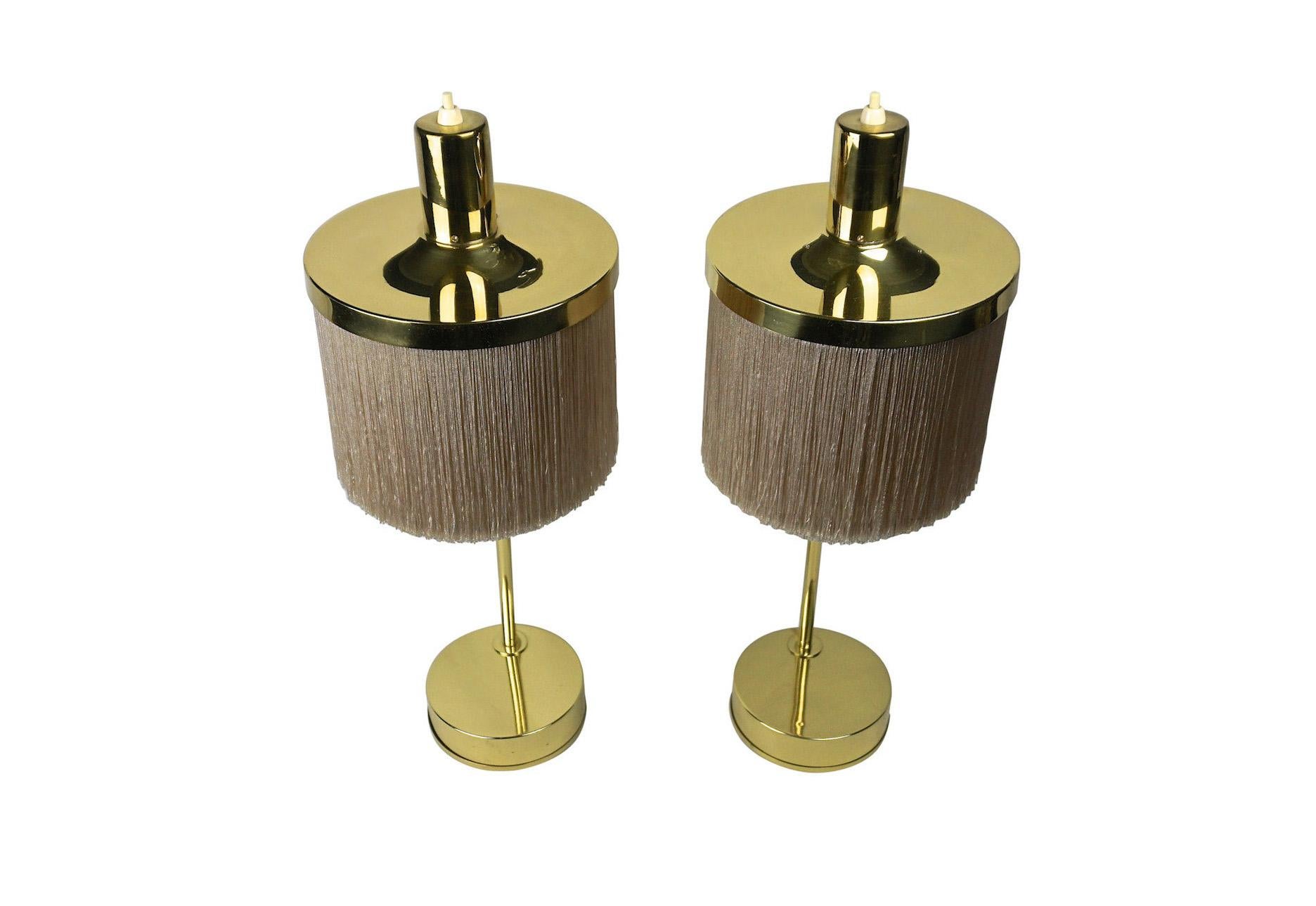 A pair of fringe silk brass table lamps model B-140 designed by Hans-Agne Jakobsson, produced by Hans-Agne Jakobsson in Markaryd, Sweden.