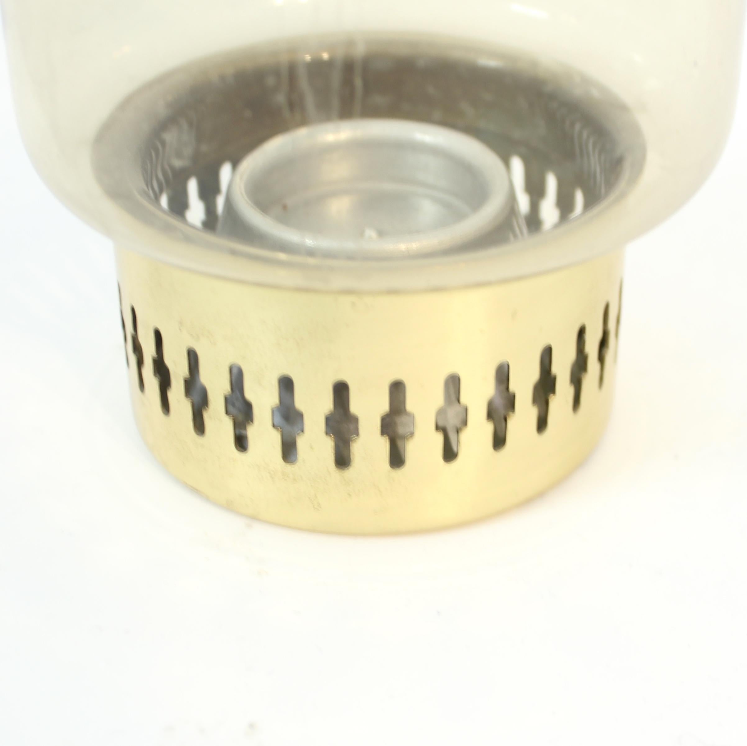 Brass Hans-Agne Jakobsson, model L 95, brass and glass candle holder, 1960s For Sale
