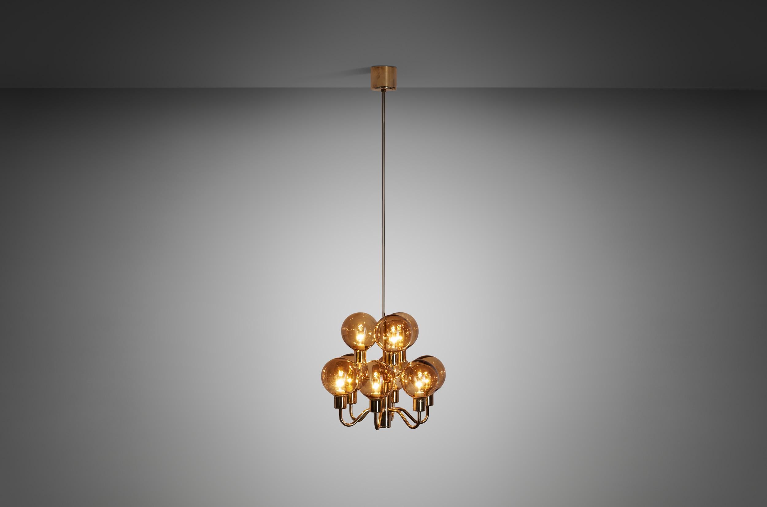 This marvellous, brass ceiling lamp was created in what we now call “the golden age of Scandinavian design”. Hans-Agne Jakobsson was the great Swedish master of lighting, designing some of the most recognizable mid-century modern lamps of