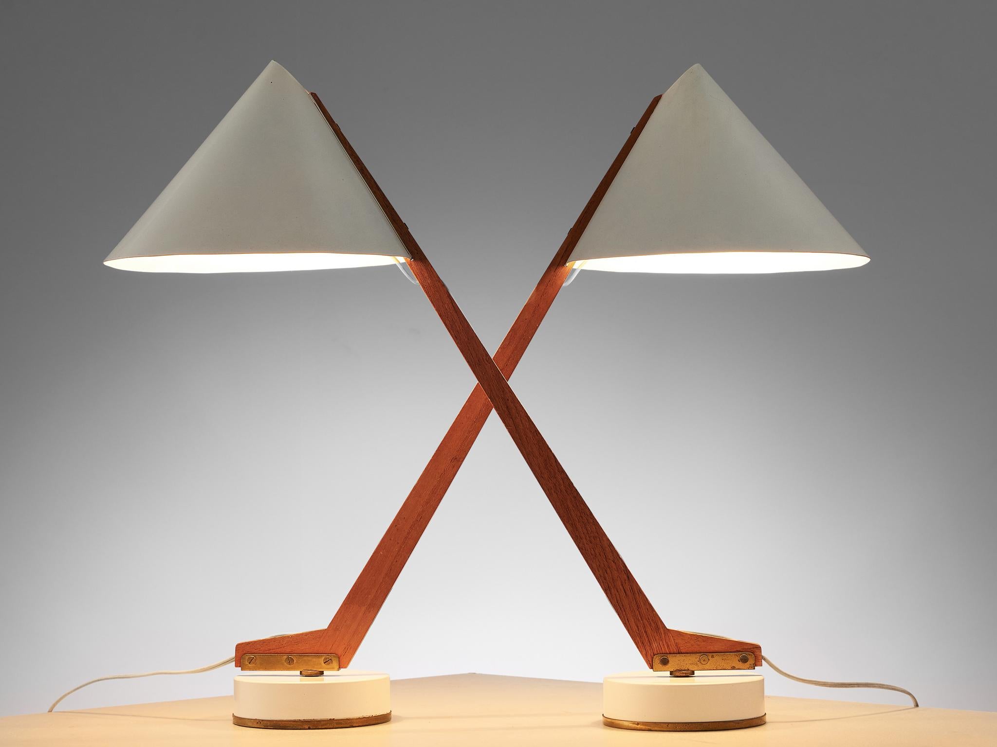 Hans Agne Jakobsson for Markaryd, set of 2 table lamps 'model B54', aluminum, brass and teak, Sweden, circa 1955.

A pair of simplistic desk lights designed by the Swedish Hans Agne Jakobsson. The lights feature a teak, tapered and slanted base,