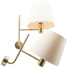 Hans-Agne Jakobsson Pair of Brass Wall Lights with Cream Shades