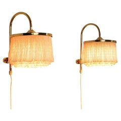 Hans-Agne Jakobsson Pair of 'Fringe' Wall Lights in Brass and Silk
