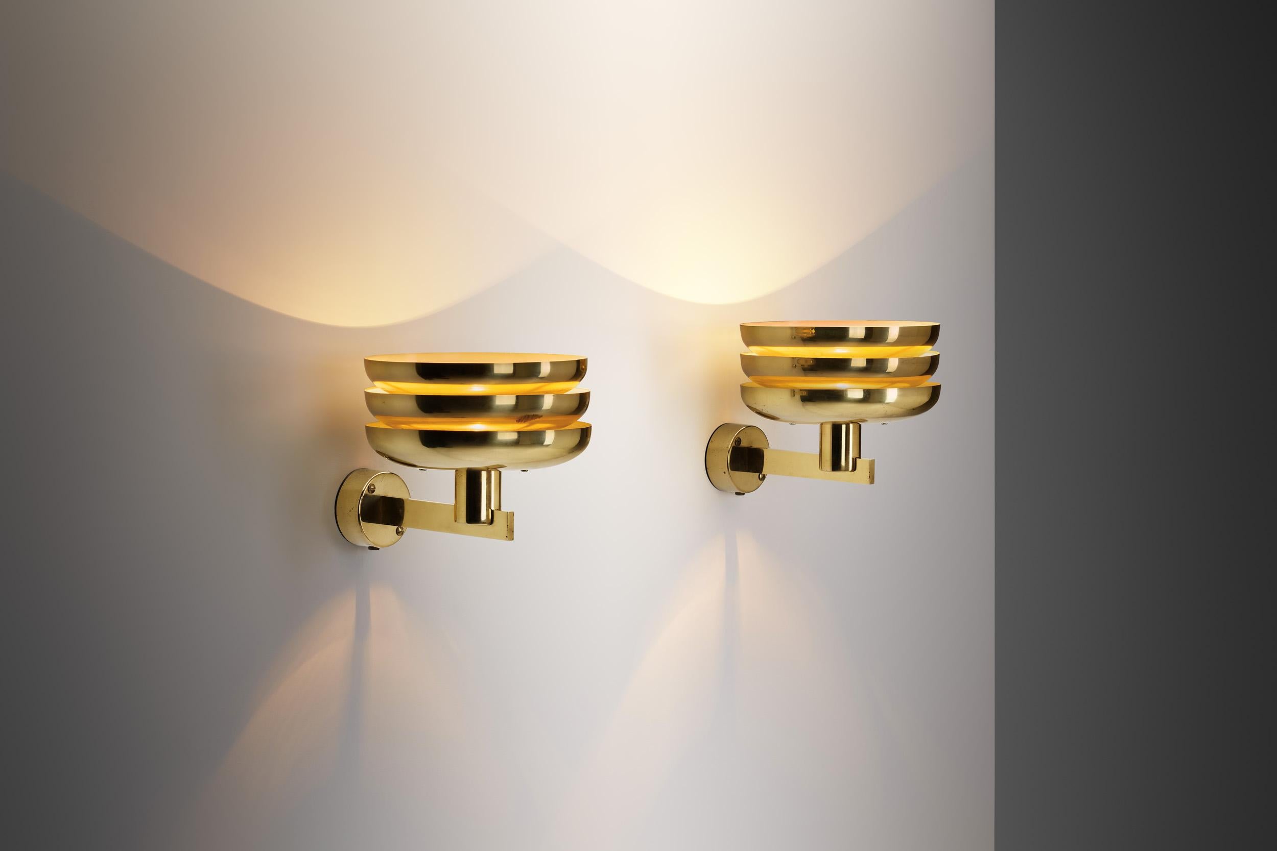 Hans-Agne Jakobsson's present “V361” wall light stands as exemplary pieces to the ingenuity of mid-century Swedish lighting design. Crafted in the 1950s for AB Markaryd, the luminaire encapsulates Jakobsson's profound influence on the mid-century