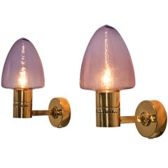 Hans-Agne Jakobsson Pair of Wall Lamps 
V-220
 in Brass and Violet Blown Glass