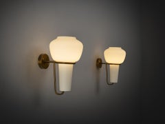 Hans-Agne Jakobsson Pair of Wall Lights in Brass and White Glass
