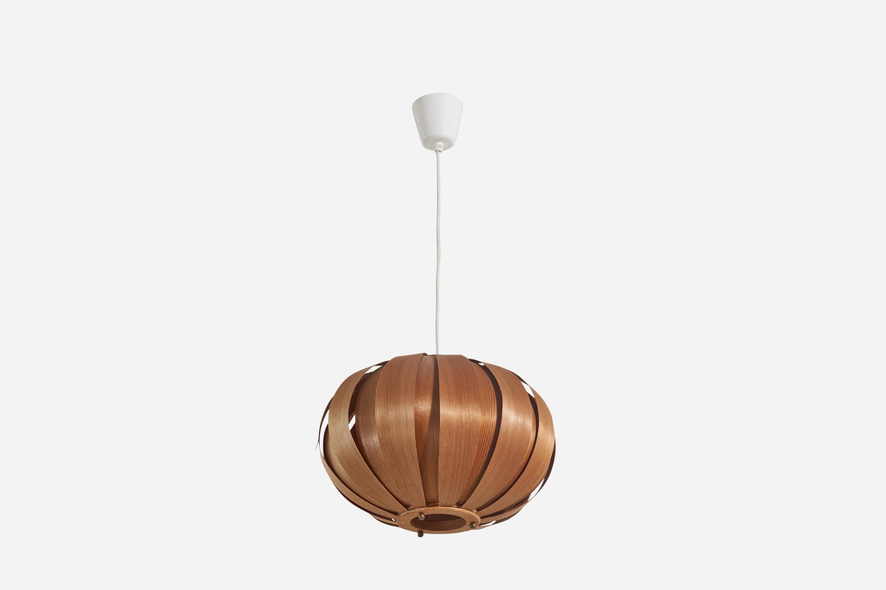 A moulded pine veneer pendant light designed and produced by Hans-Agne Jakobsson, Sweden, 1970s.

Dimensions variable, measured as illustrated in first image.

Dimensions of canopy (inches) : 3.45 x 3.37 x 3.37 (height x width x depth)

Socket