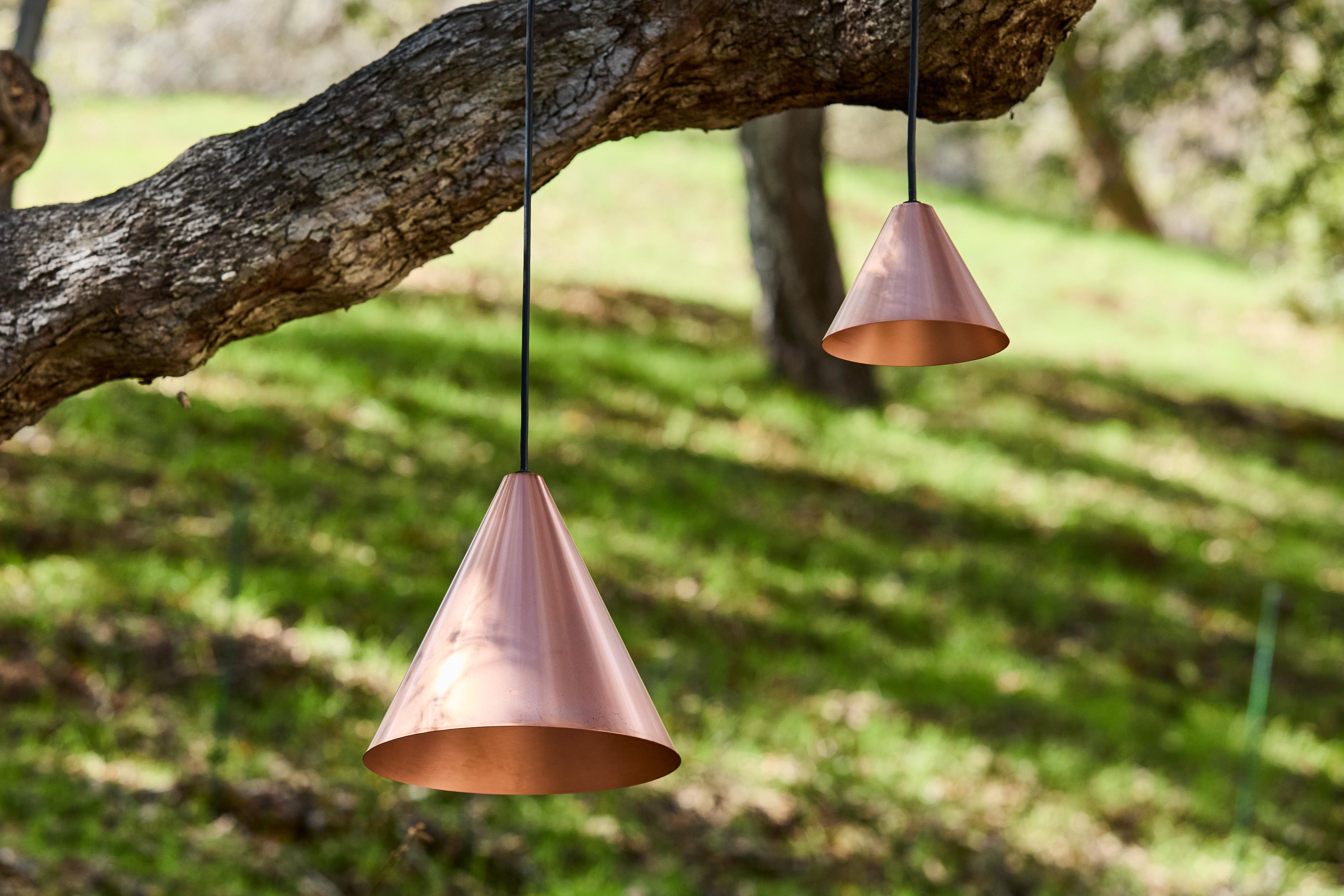 Hans-Agne Jakobsson Raw Copper 'Mini-Tratten' Outdoor Pendant.

An exclusive made for U.S. and UL listed authorized re-edition of the classic Swedish design from Jakobsson, Executed in raw unlacquered copper with a burnished interior finish. An