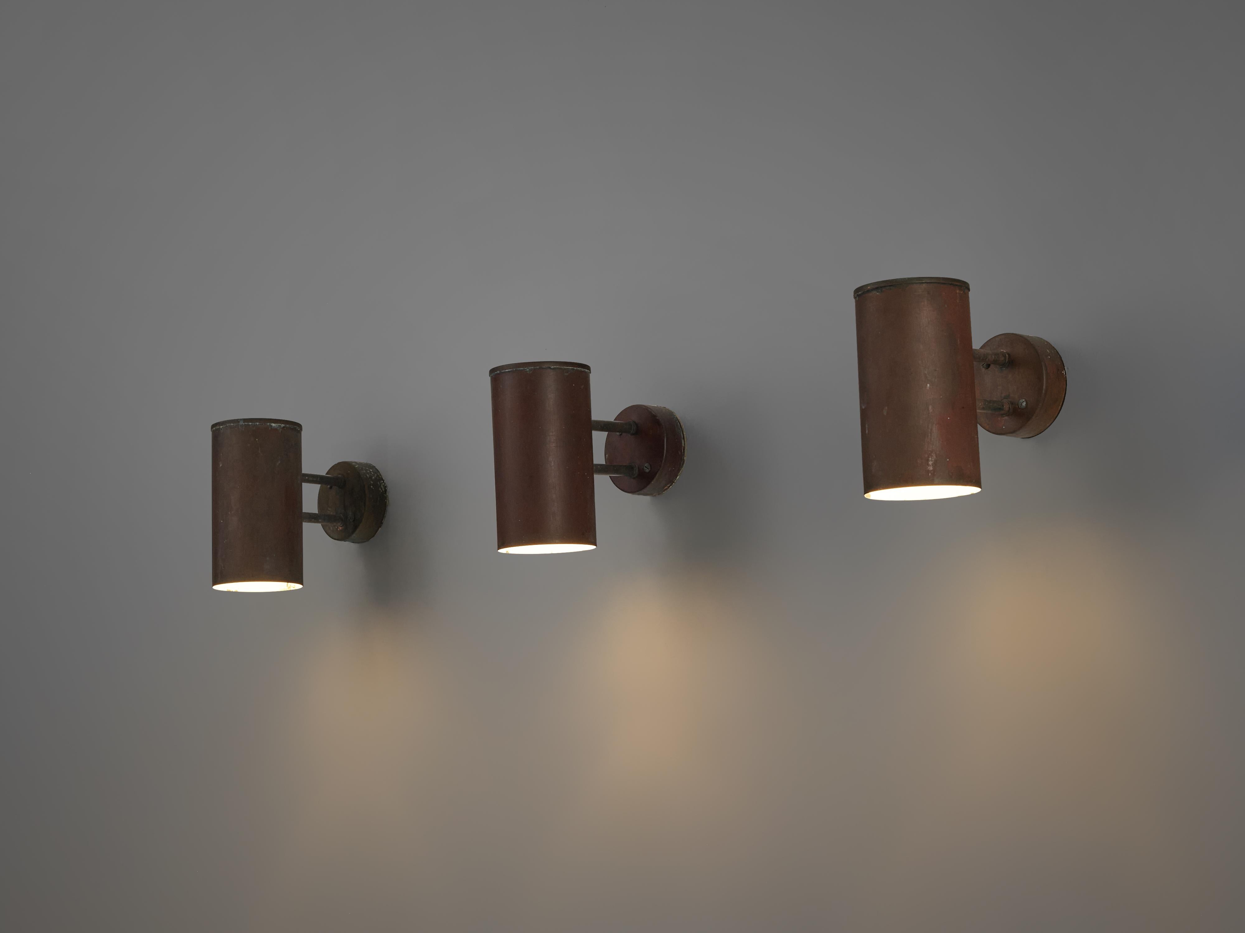 Hans-Agne Jakobsson, ‘Rulle’ wall lights, copper, Sweden, 1960s

The ‘Rulle’ outdoor lights by Swedish designer Hans-Agne Jakobsson feature a cylindric lampshade that is connected to a circular fixation. The way the rich patina structures the