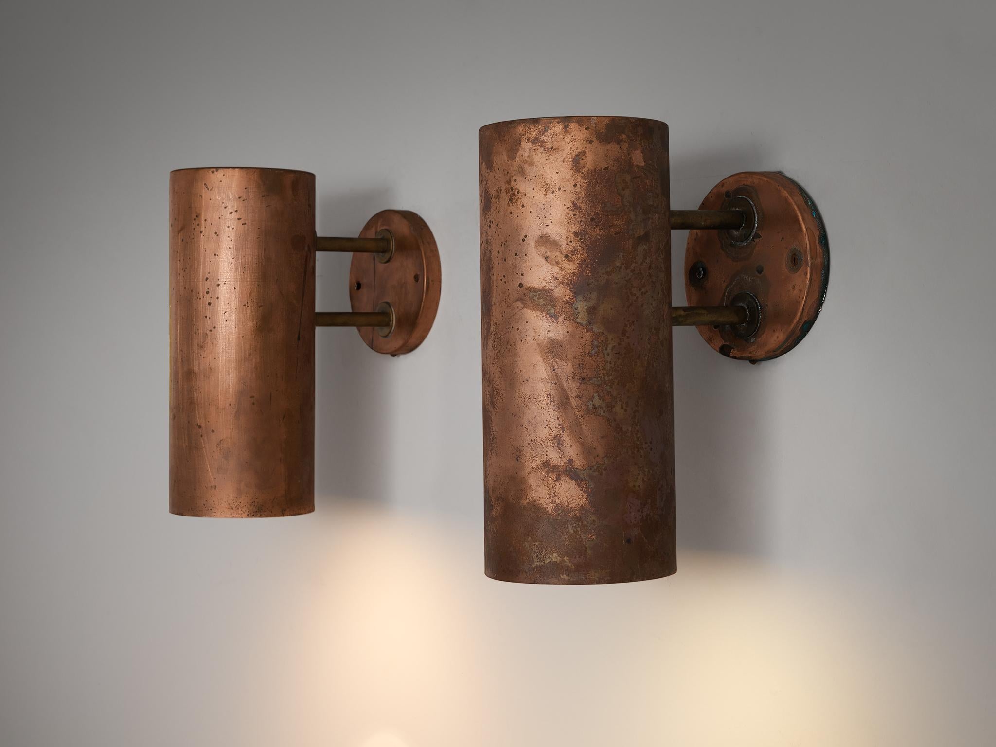 Hans-Agne Jakobsson for Hans-Agne Jakobsson AB in Markaryd, ‘Rulle’ wall lights, copper, Sweden, 1960s.

Beautiful orange copper ‘Rulle’ outdoor lights by Swedish designer Hans-Agne Jakobsson. These lights feature a cylindric lampshade that is
