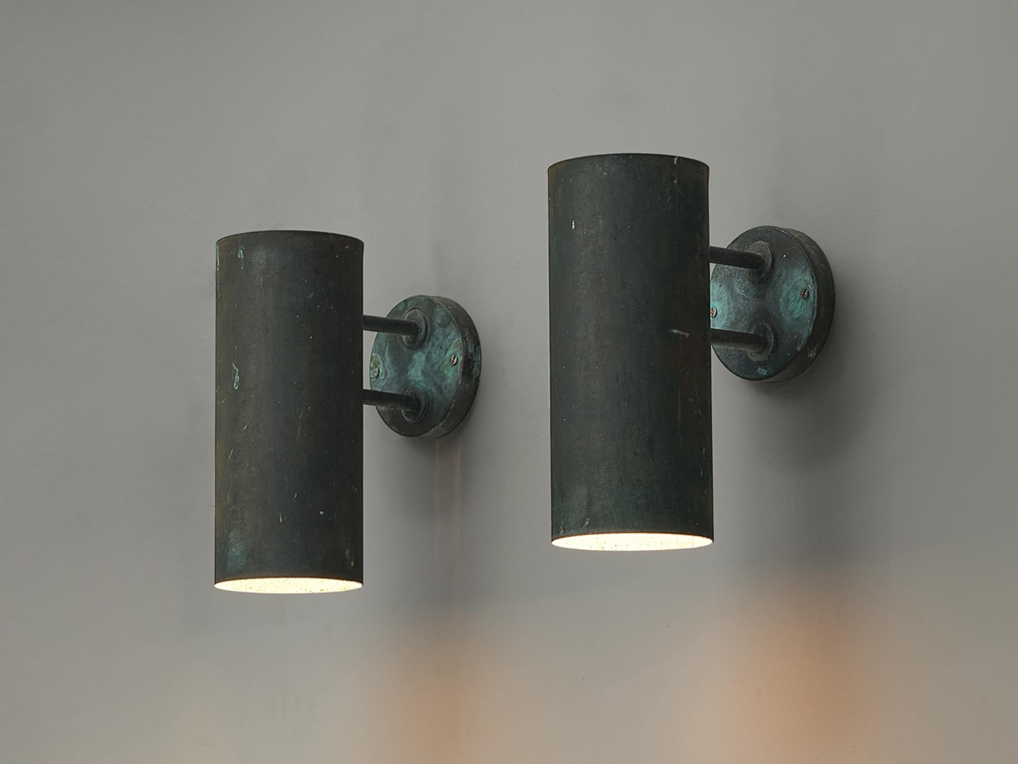 Hans-Agne Jakobsson for Hans-Agne Jakobsson AB in Markaryd, ‘Rulle’ wall lights, copper, Sweden, 1960s

The ‘Rulle’ outdoor lights by Swedish designer Hans-Agne Jakobsson feature a cylindric lampshade that is connected to a circular fixation. The