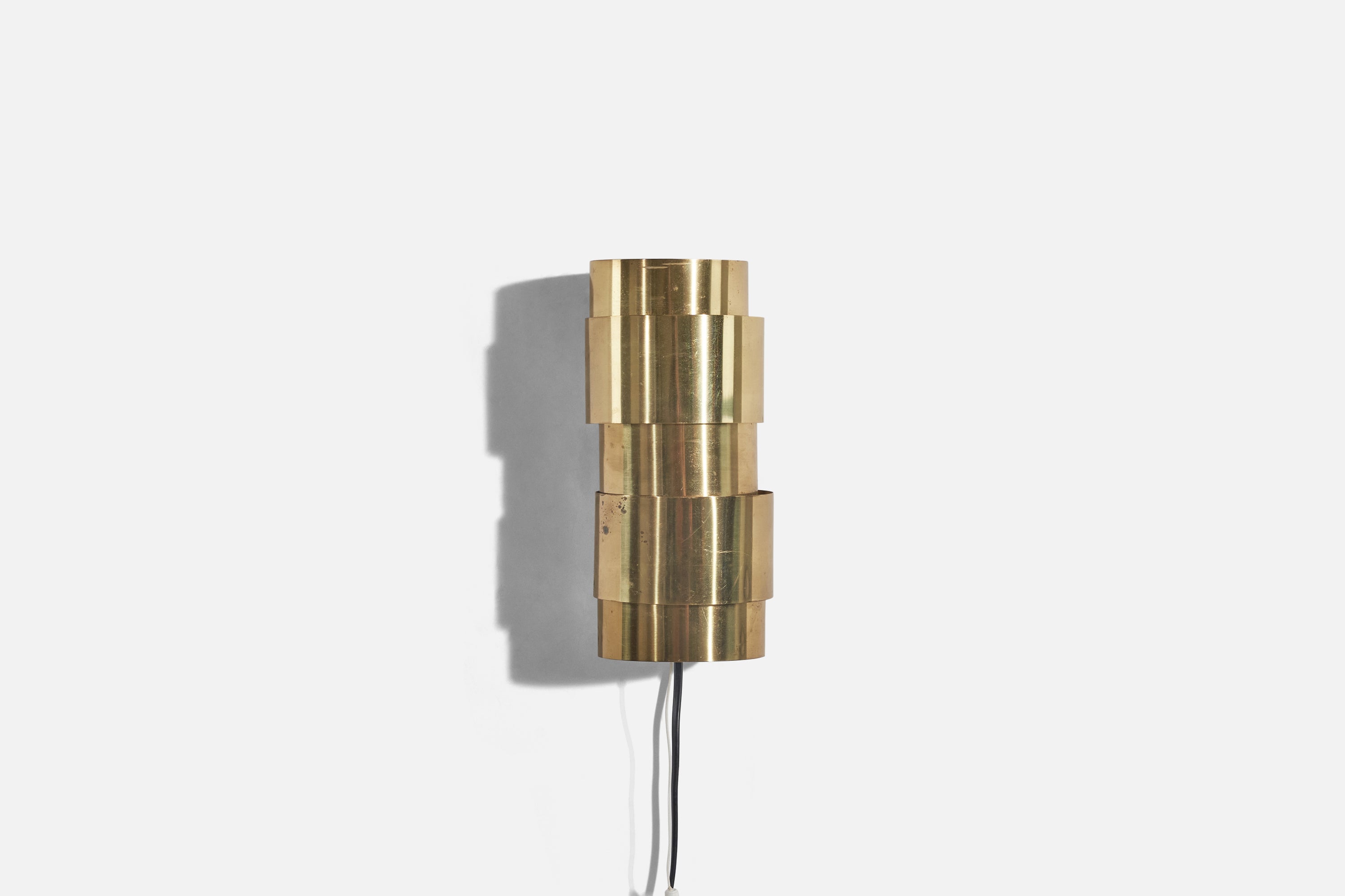 A pair of brass and teak sconces, V-155 model, designed by Hans Agne Jakobsson and produced by Hans-Agne Jakobsson AB, Markaryd, Sweden, c. 1960s.

