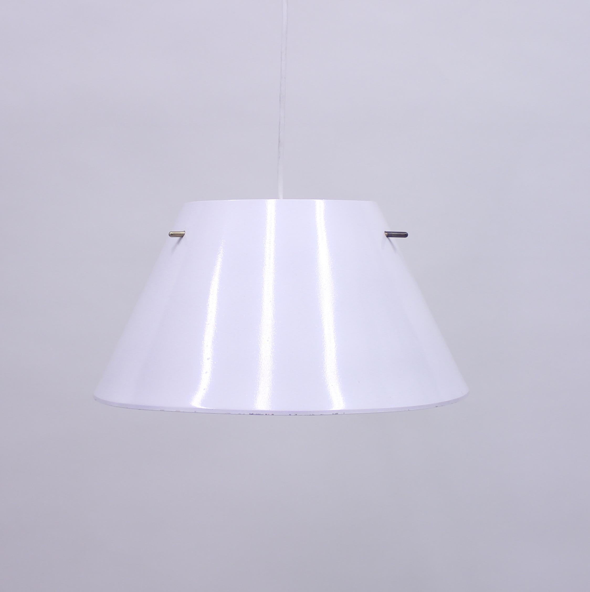 White sheet metal ceiling lamp with brass details produced by Hans-Agne Jakobsson AB. Good vintage condition with light ware. Marked with sticker from manufacturer.