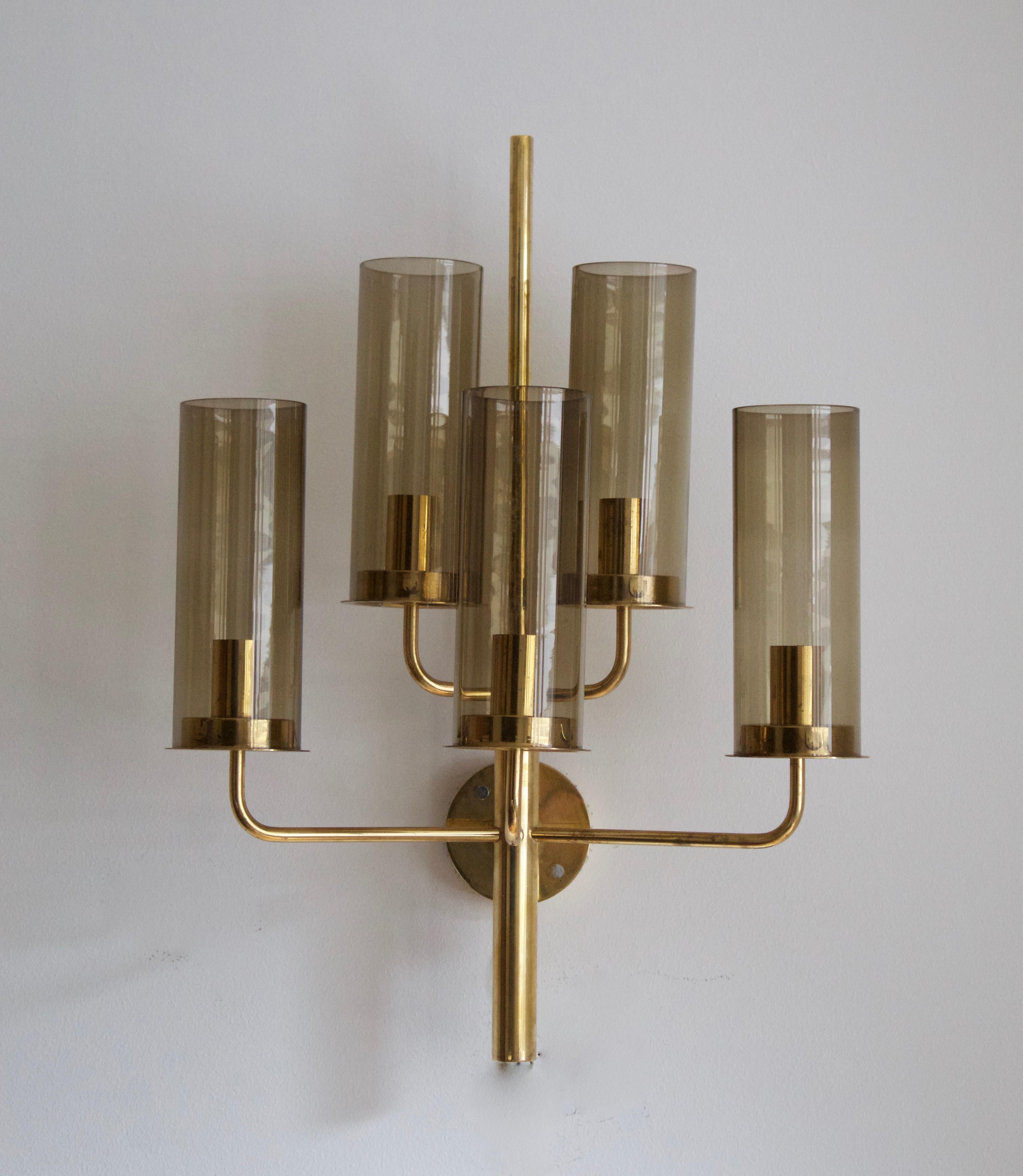 A sizable wall light, designed by Hans-Agne Jakobsson for his own firm in Markaryd, Sweden. c. 1960s. Original smoke glass difusers.