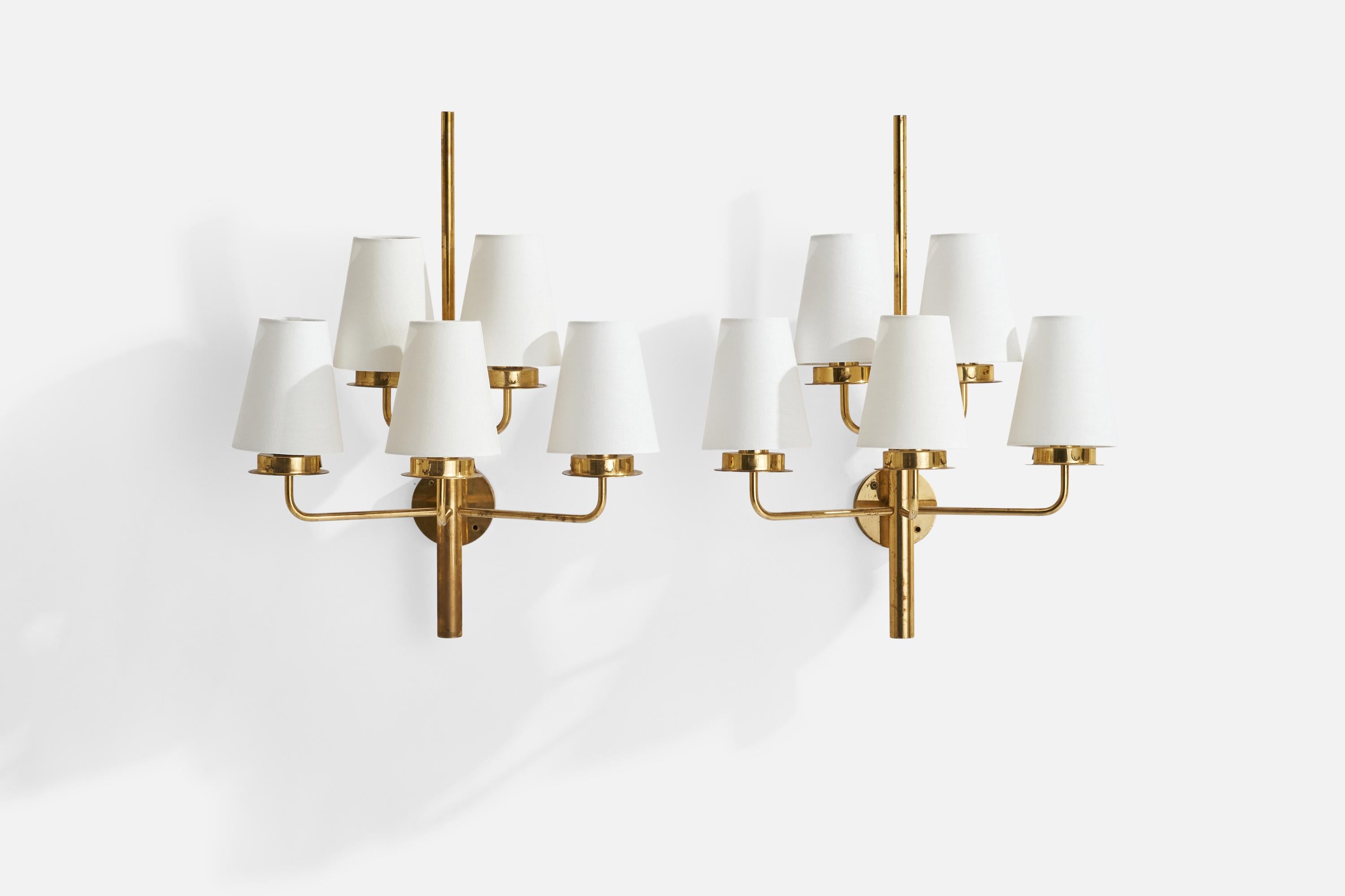 A pair of sizeable five armed brass and white fabric wall light designed and produced by Hans-Agne Jakobsson, Markaryd, Sweden, 1960s.

Overall Dimensions (inches): 24.25”H x 18” W x 10.5” D
Stated dimensions include shade.
Bulb Specifications: E-14