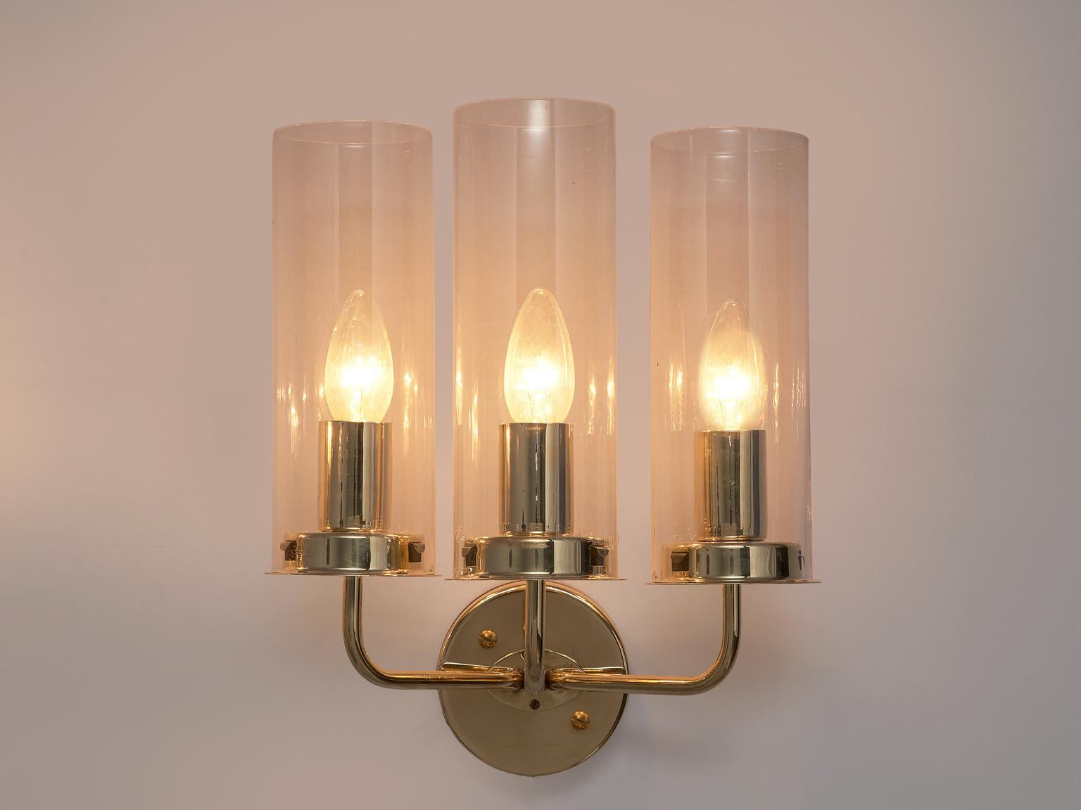 Hans-Agne Jakobsson for Hans-Agne Jakobsson AB in Markaryd, 'Sonata' wall light, brass and glass, Sweden, 1960s

Elegant wall light designed by Swedish Master of Light; Hans Agne Jakobsson. This classic lamp features a round fixture with three arms