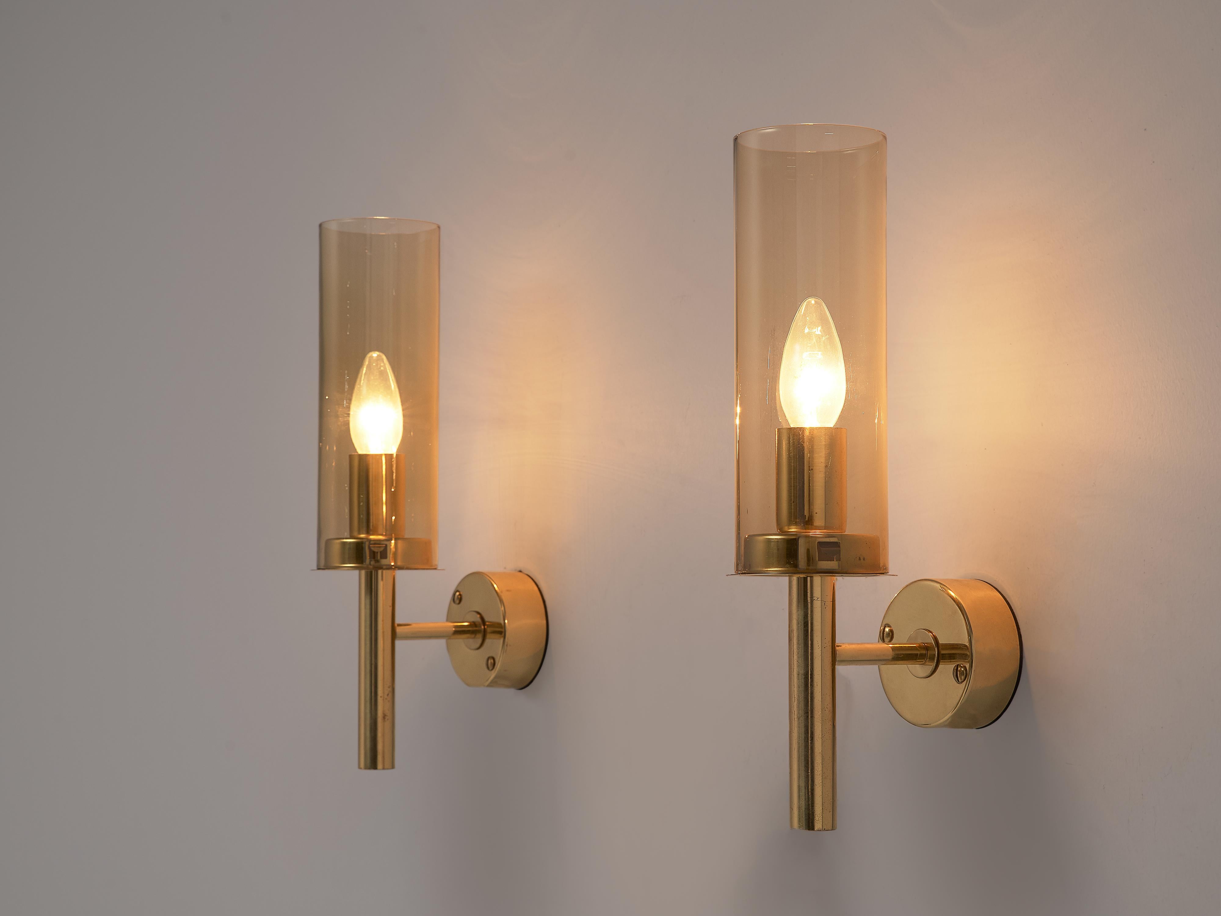 Hans-Agne Jakobsson, set of wall lights model V-169, brass, glass, Sweden, 1960s

This set of brass and glass wall lamps, model V-169 from the 'Sonata' collection, was designed by Hans-Agne Jakobsson in Sweden during the 1960s. The wall lamps