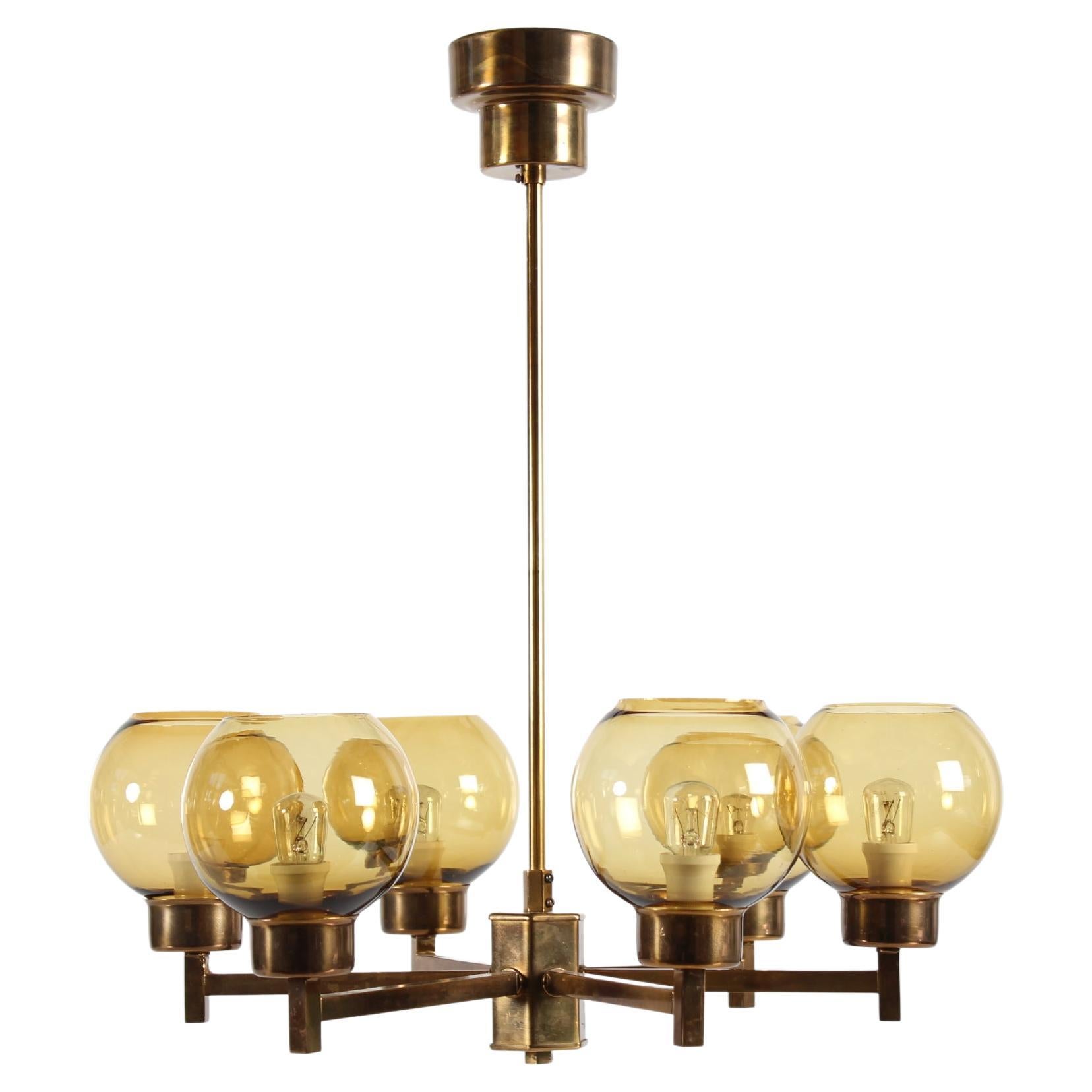Hans Agne Jakobsson Style Six-Armed Chandelier of Brass and Glass Sweden 1970s For Sale