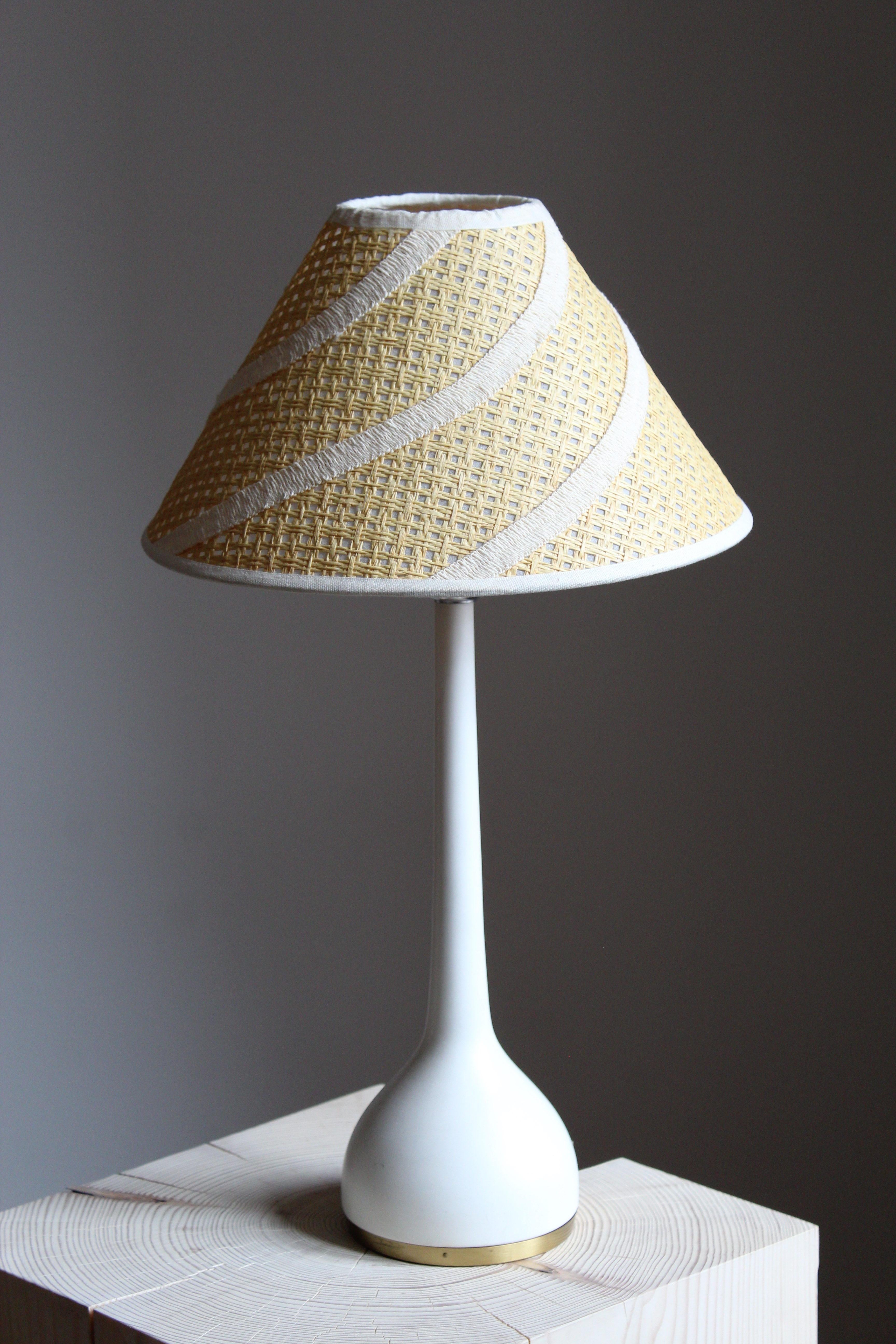 A table lamp designed and produced by Hans-Agne Jakobsson, Markaryd, Sweden, 1970s. 

Other designers of the period include Paavo Tynell, Hans Bergström, Josef Frank, Alvar Aalto, and Finn Juhl.