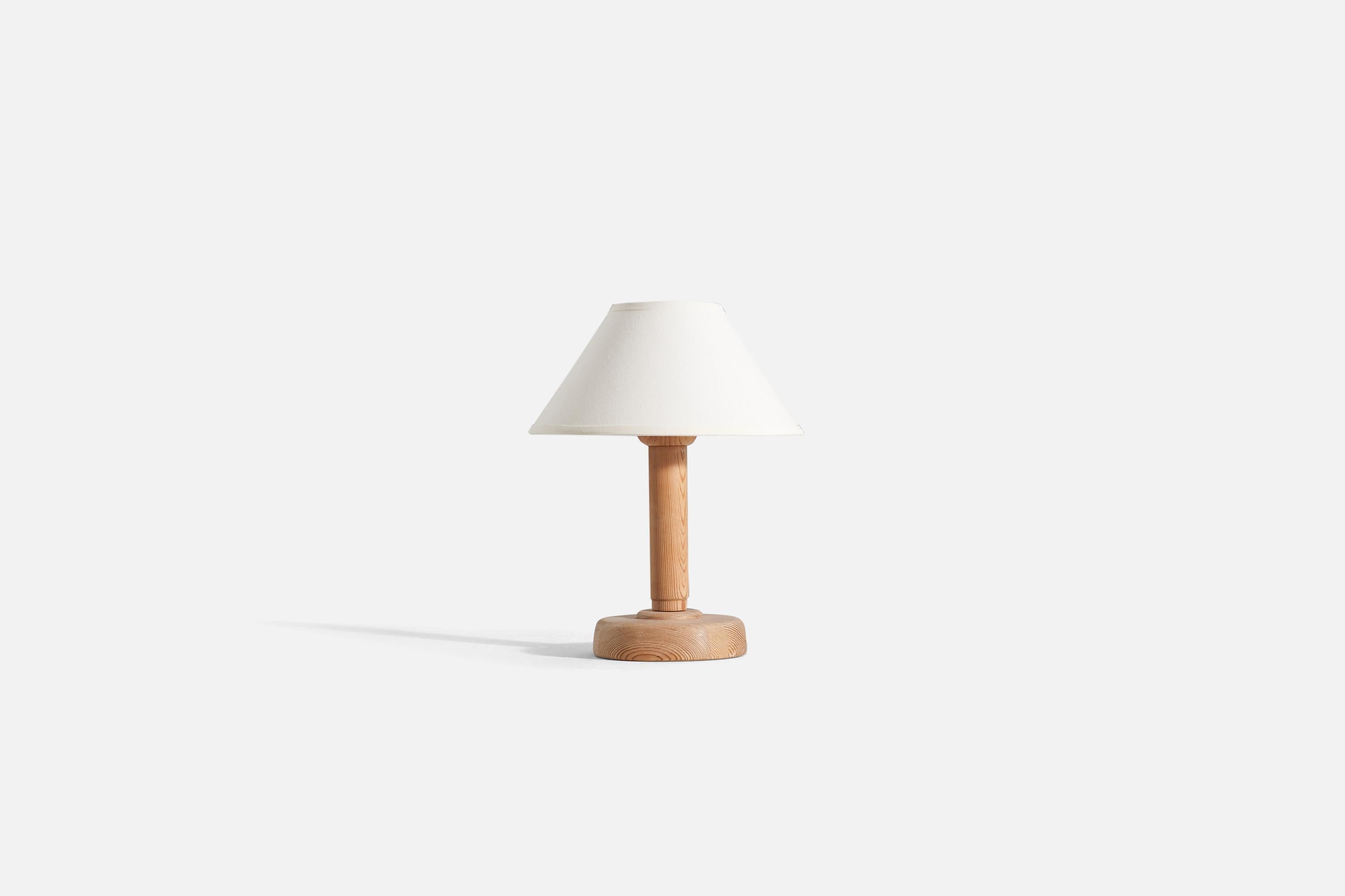 A light pine wood table lamp, designed by Hans-Agne Jakobsson, Sweden, 1970s.