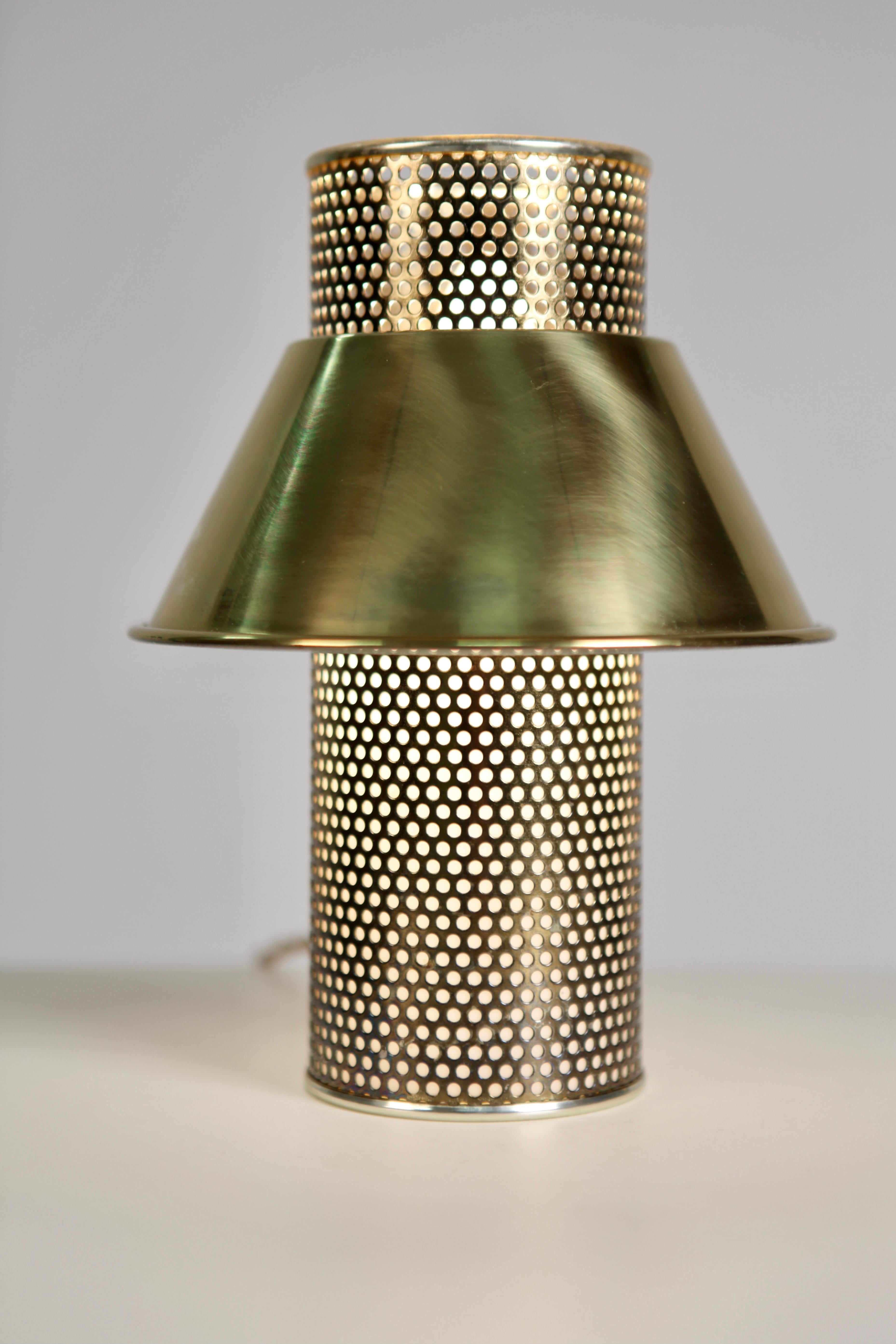 A perforated brass table lamp by Hans-Agne Jakobsson, Sweden.
Excellent vintage condition, rewired, socket for 1 bulb.
   