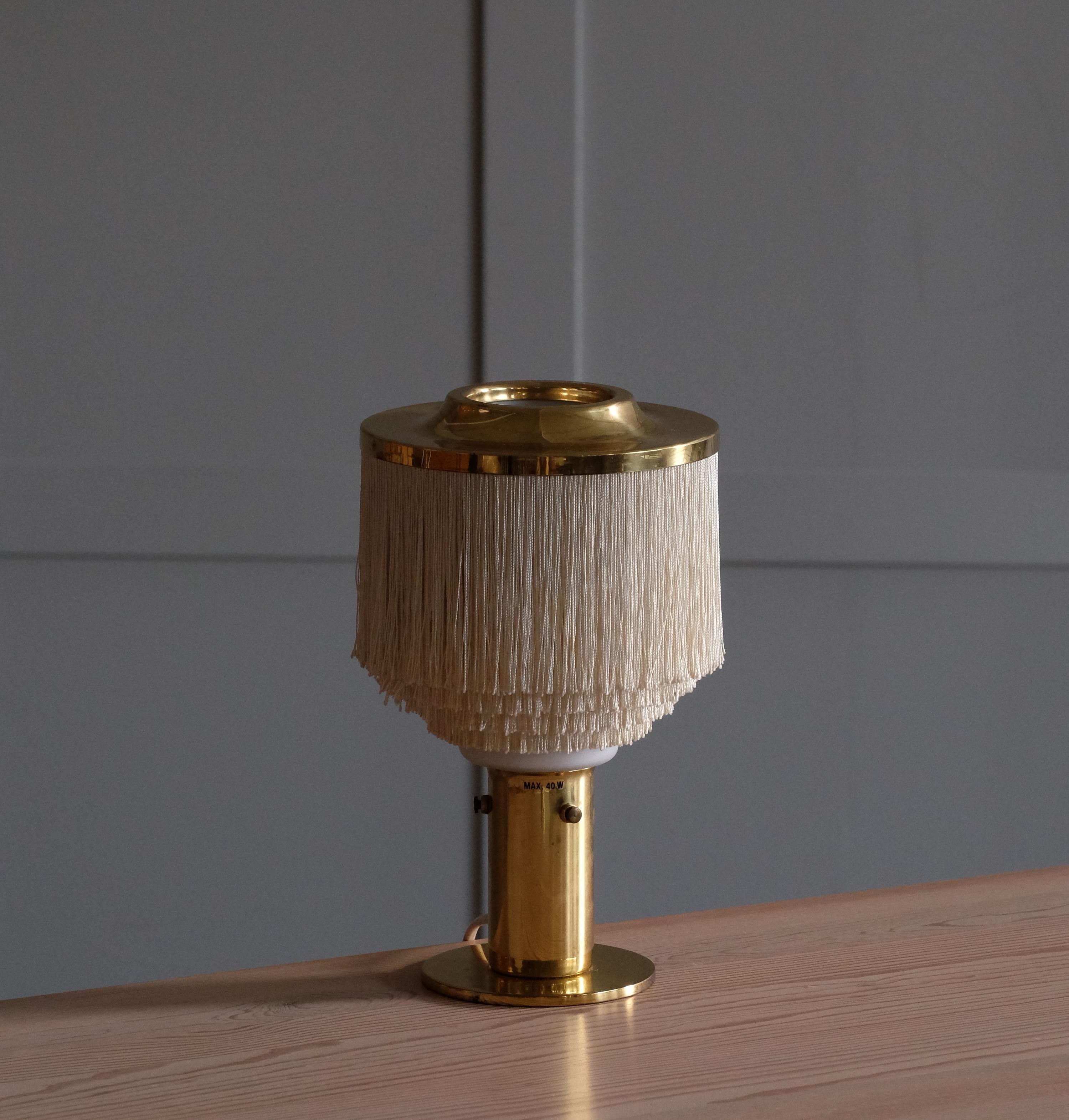 Fringes, brass and opaline glass shade. Produced by Hans-Agne Jakobsson, Markaryd, 1960s.