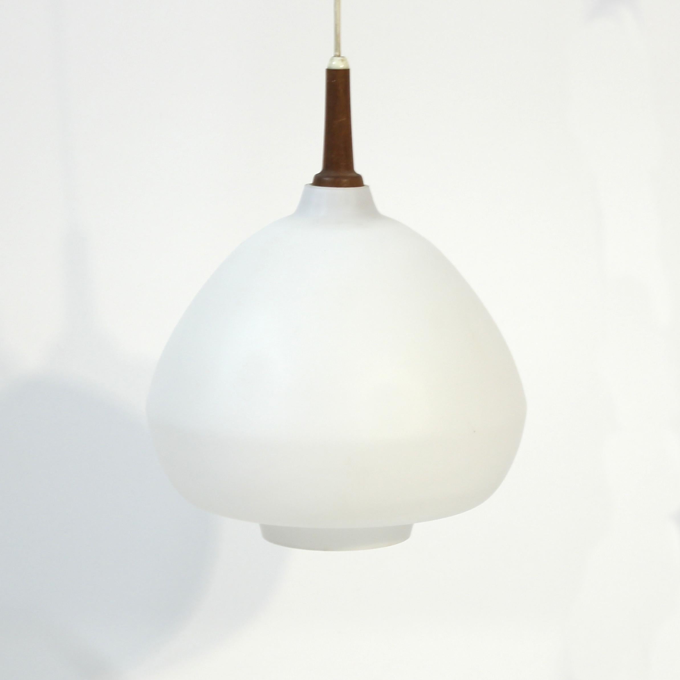 Swedish Hans-Agne Jakobsson, teak and opaline glass ceiling lamp, 1950s For Sale