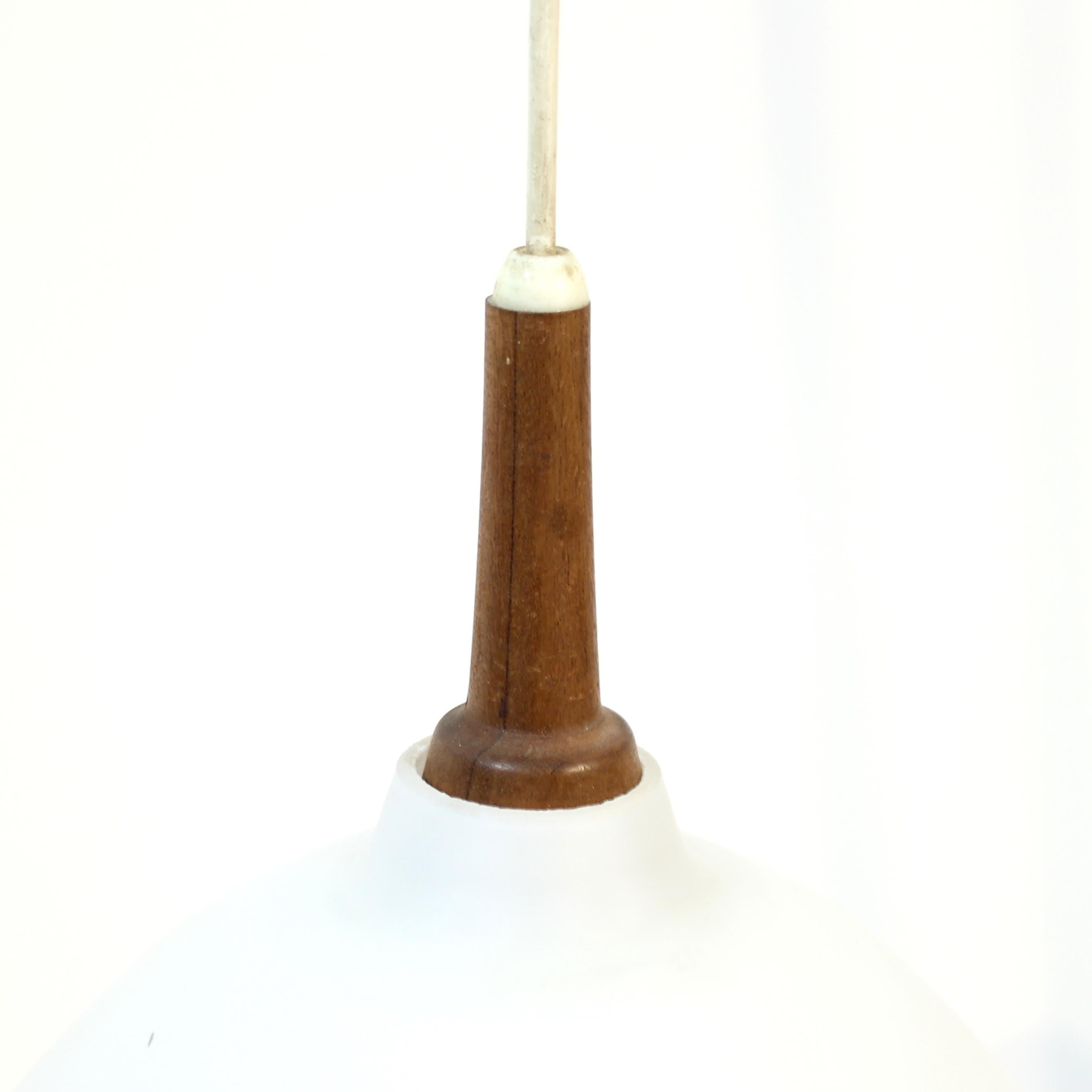 20th Century Hans-Agne Jakobsson, teak and opaline glass ceiling lamp, 1950s For Sale