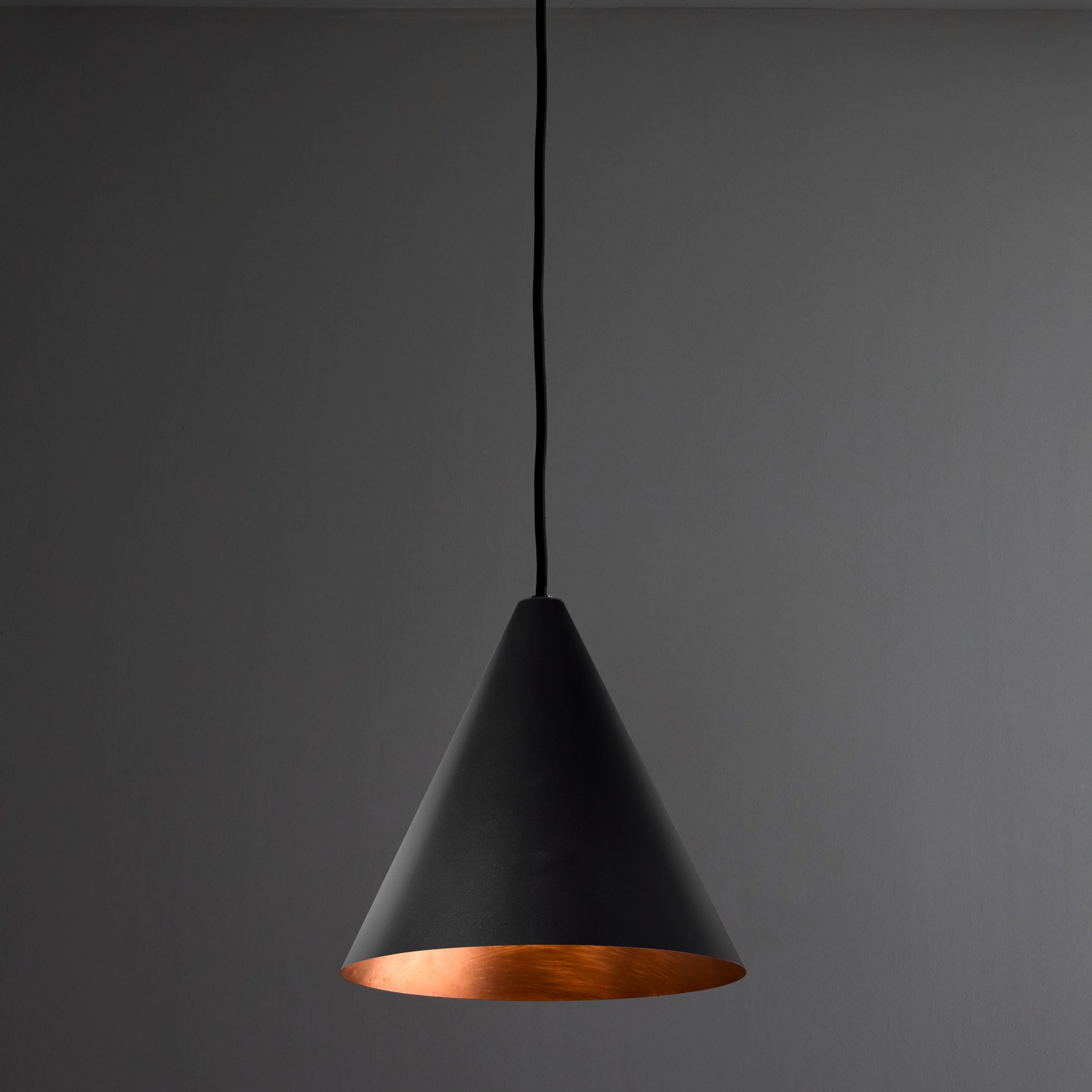 Hans-Agne Jakobsson 'Tratten' Outdoor Pendant in Black

An exclusive made for U.S. and UL listed authorized re-edition of the classic Swedish design from Jakobsson, executed in black painted metal with a burnished interior finish. An incredibly