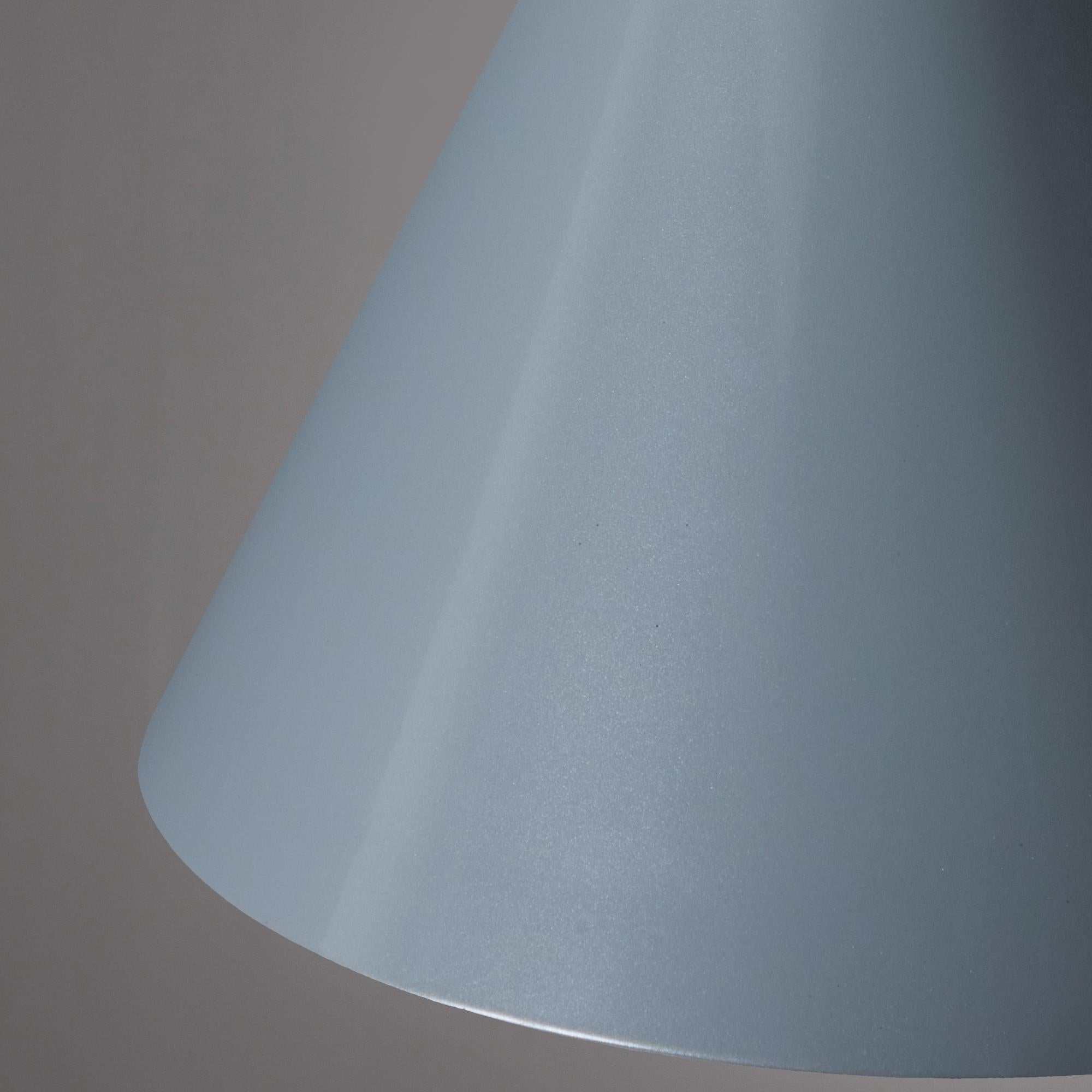 Hans-Agne Jakobsson 'Tratten' Outdoor Pendant in Silver.

An exclusive made for U.S. and UL listed authorized re-edition of the classic Swedish design from Jakobsson, executed in silver painted metal with a burnished interior finish. An incredibly