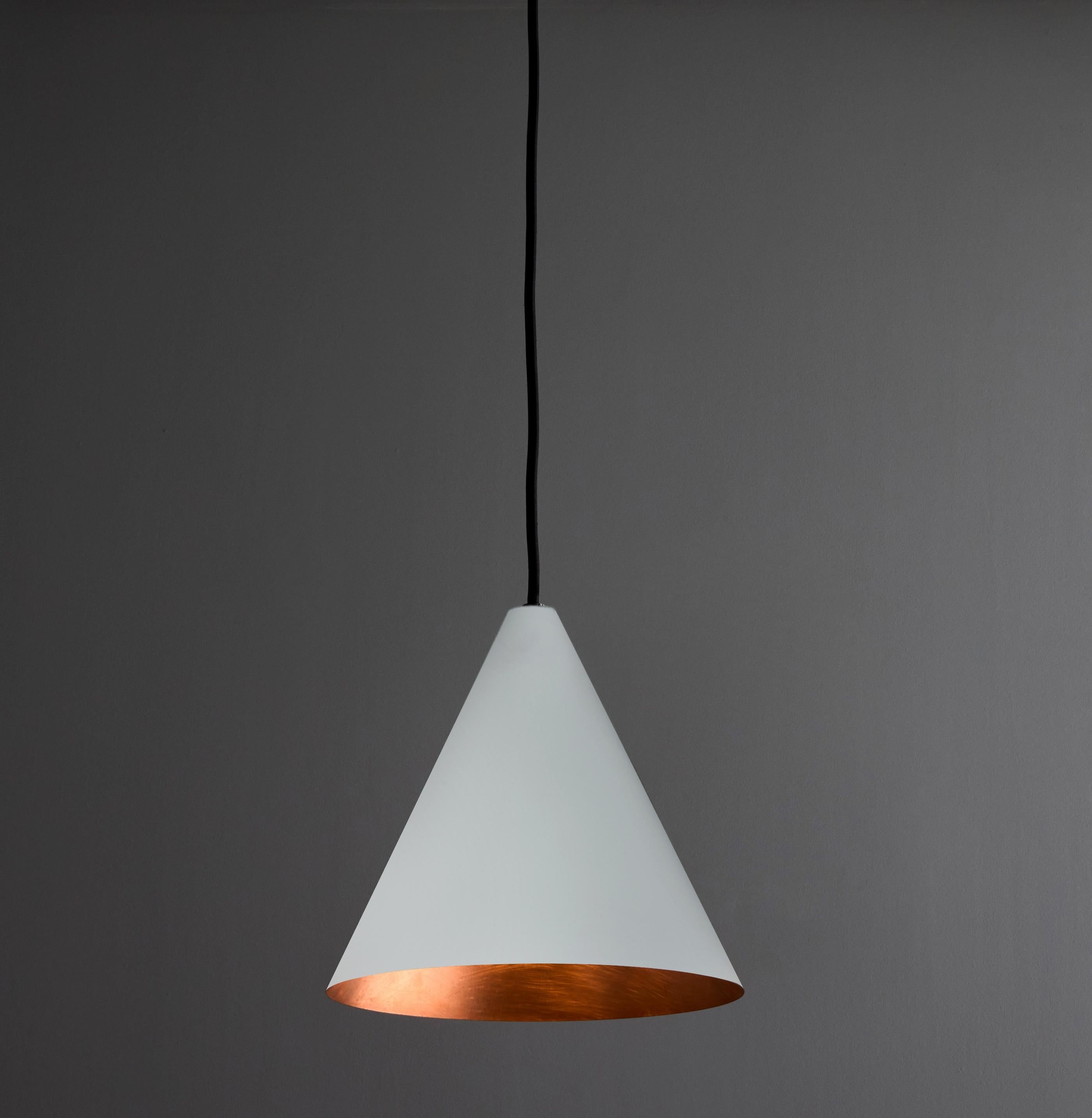 Hans-Agne Jakobsson 'Tratten' Outdoor Pendant in White

An exclusive made for U.S. and UL listed authorized re-edition of the classic Swedish design from Jakobsson, executed in white painted metal with a burnished interior finish. An incredibly