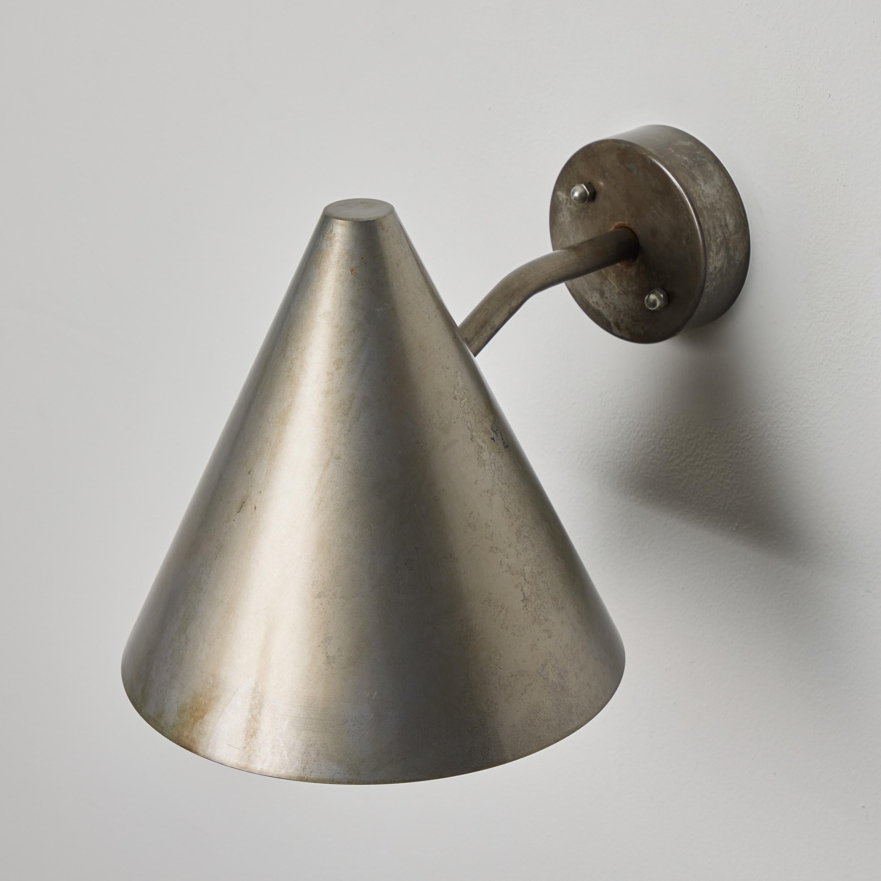 Hans-Agne Jakobsson 'Tratten' Outdoor Sconce in Silver Steel. A classic Swedish design executed in solid steel. An incredibly refined design that is quintessentially Scandinavian, ideal for indoor or outdoor use.

Price is per item. A limited run of
