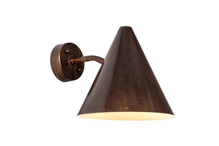 Pair of Hans-Agne Jakobsson 'Tratten' dark brown patinated outdoor sconces. Executed in richly patinated metal. An incredibly refined design that is quintessentially Scandinavian. Designed for indoor or outdoor use.

Price is per pair. Several lamps