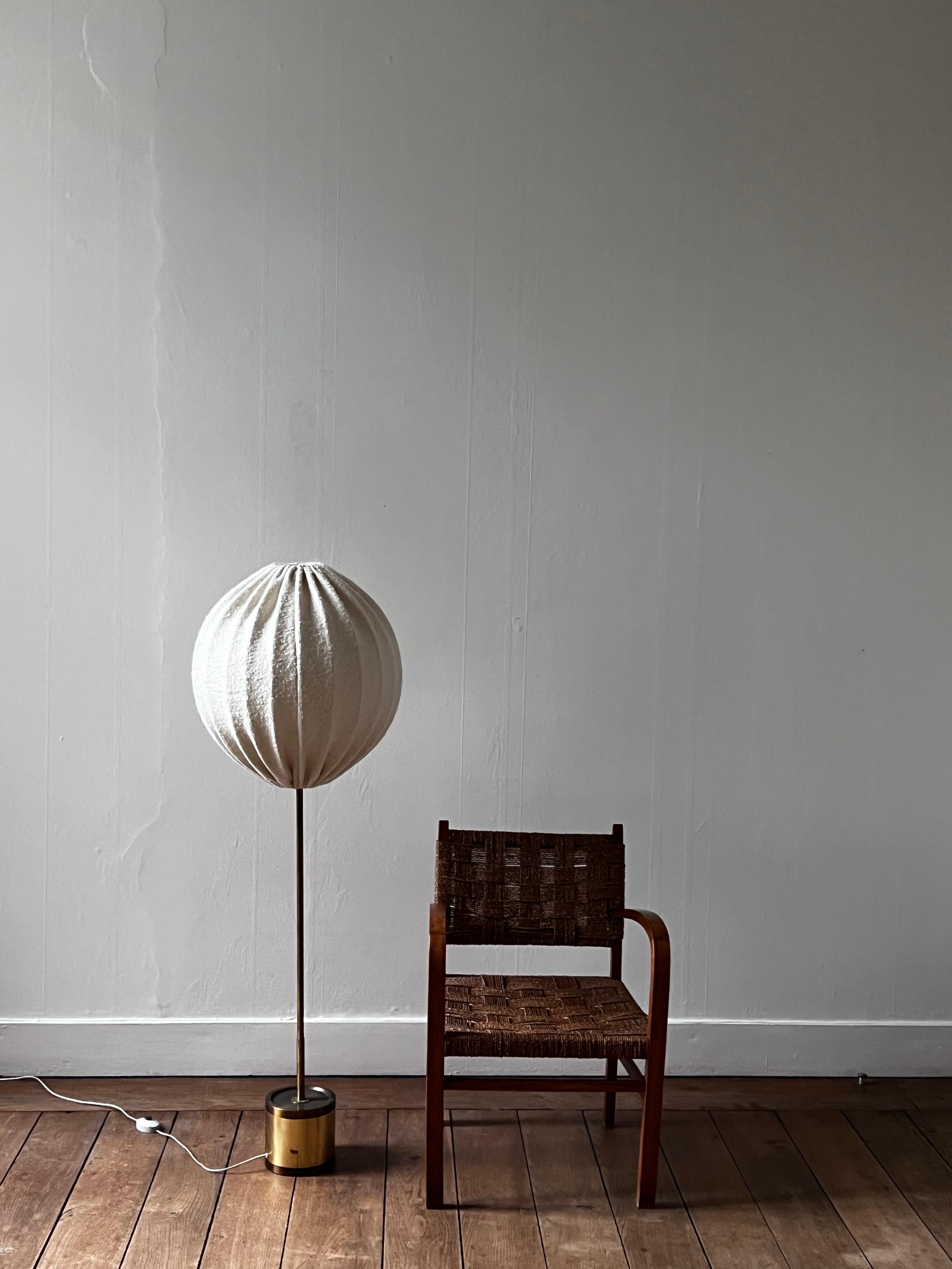 charming brass and wool floor lamps by Hans Agne Jakobsson. The shade is the original shape but received a new handmade woolen fabric to that was produced in Belgium. It provides a very warm feeling and a cocooning atmosphere. 


Hans-Agne Jakobsson