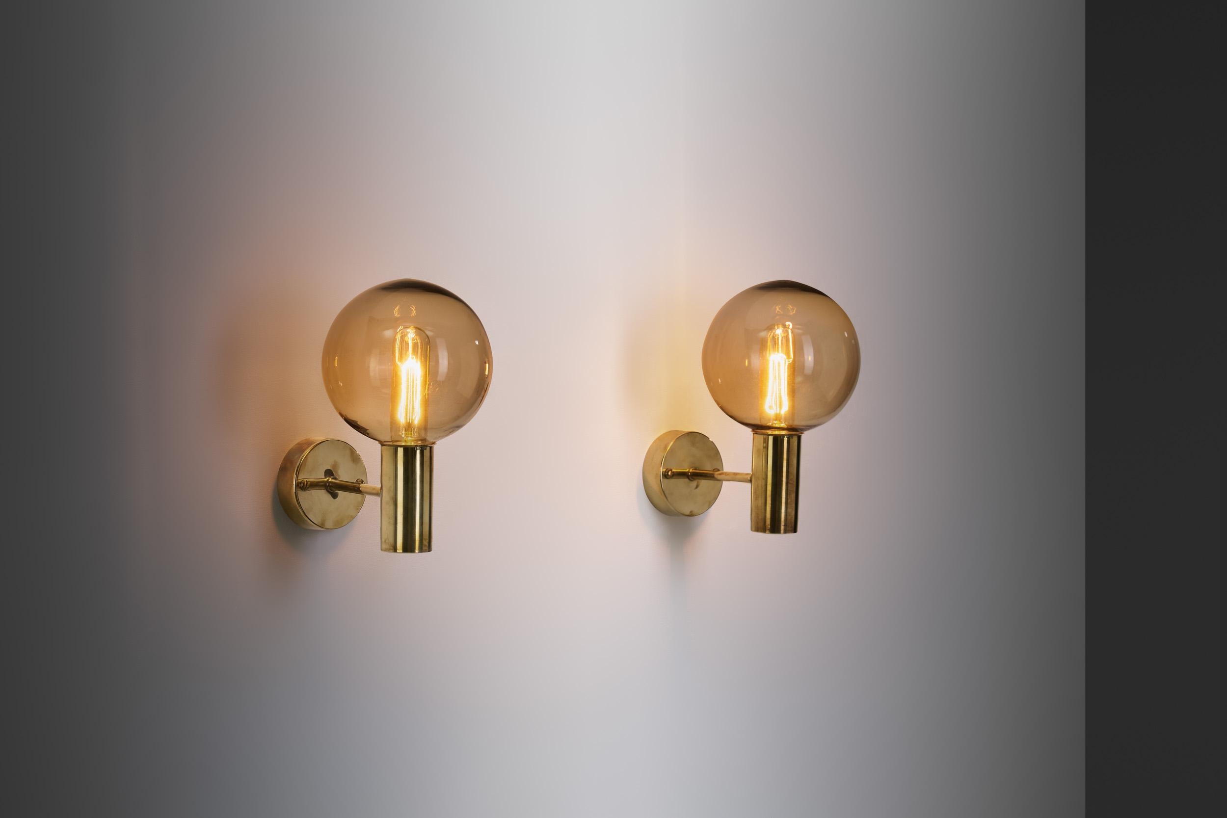 While Hans-Agne Jakobsson designed and produced various types of furniture, his lighting received greater international attention, not without a good reason. As these “V-149” wall sconces showcase, the Swedish designer mastered both the direction